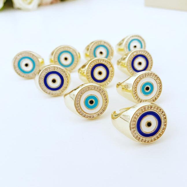 Adjustable gold Round Evil Eye Ring featuring a blue evil eye design, perfect for boho jewelry enthusiasts.