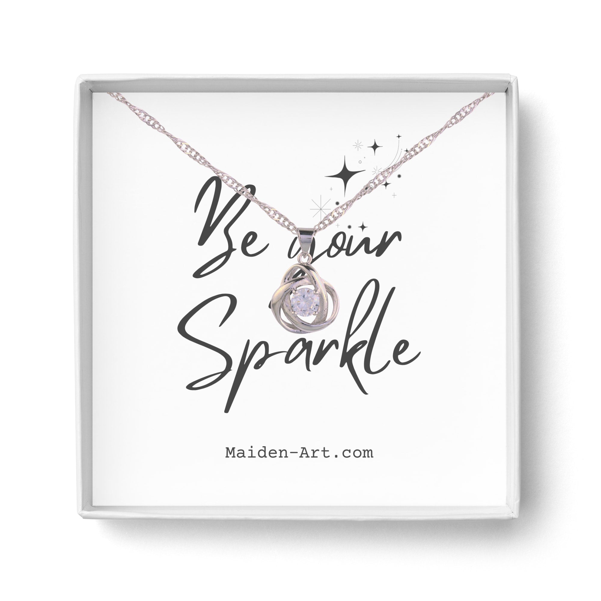 Round Knot Pendant Necklace featuring clear cubic zirconia on a brass rhodium plated chain, elegantly designed for stylish wear.