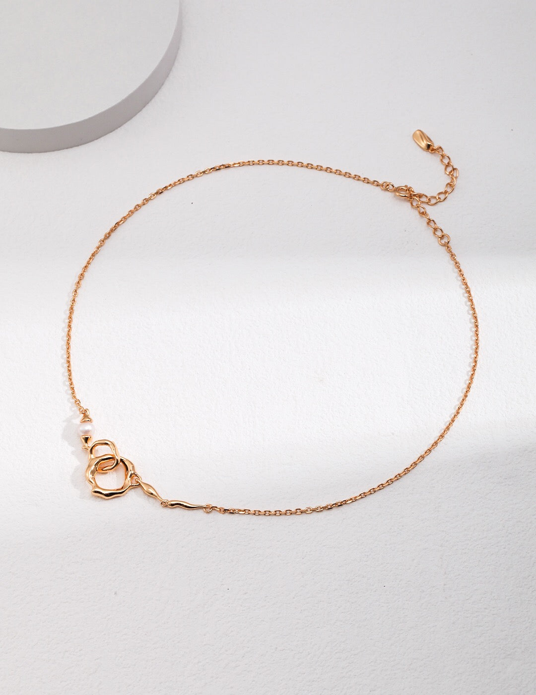 Elegant Round Black Onyx and Pearl Necklace with gold vermeil chain, showcasing natural pearls and onyx stones.