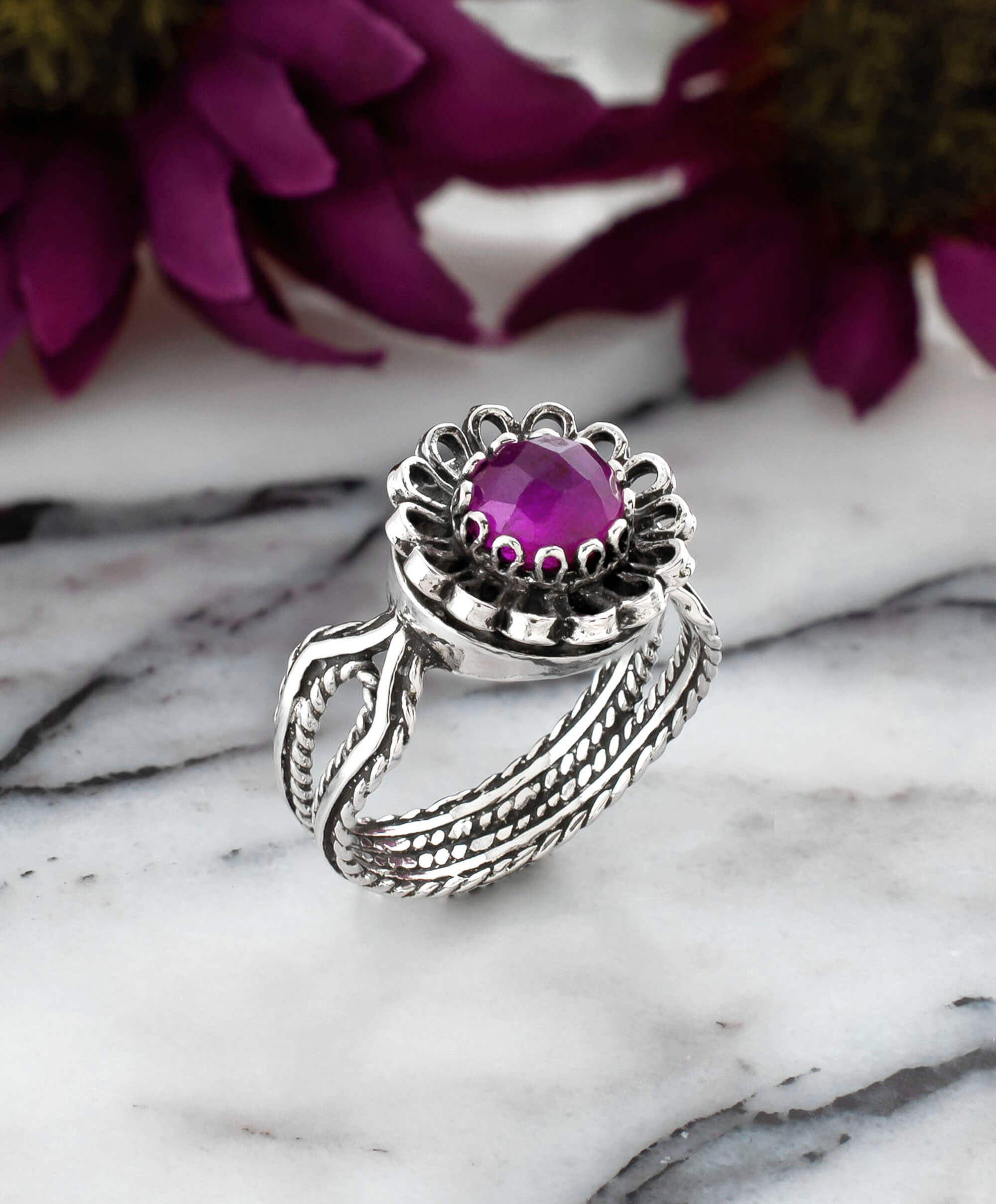 Elegant Ruby Corundum Gemstone Sterling Silver Cocktail Ring with intricate flower design and luxurious finish.