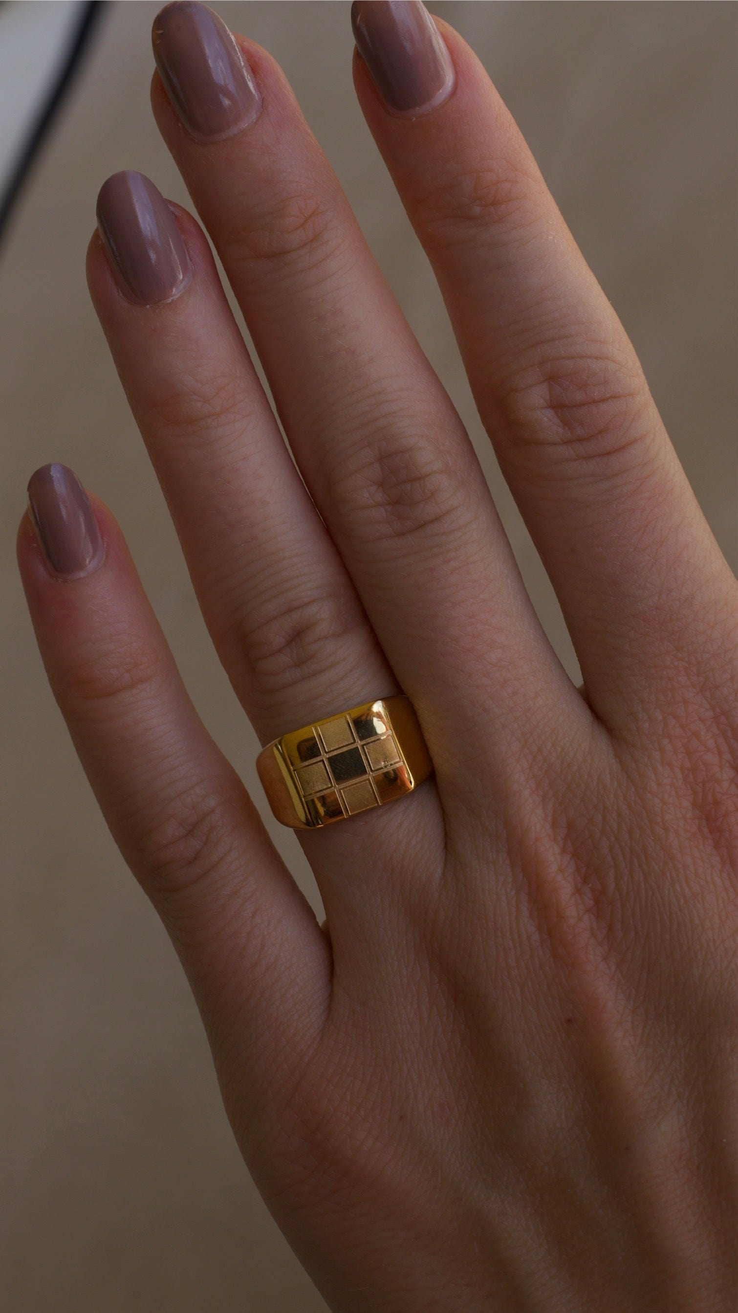 Sacra Geometric Gold Check-board Block Ring showcasing its elegant design and 18Kt yellow gold coating.