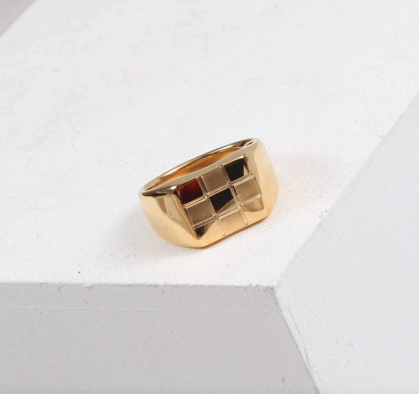 Sacra Geometric Gold Check-board Block Ring showcasing its elegant design and 18Kt yellow gold coating.