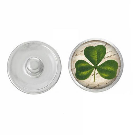 A vibrant green Clover snap designed for Ginger Snaps jewelry, showcasing intricate details perfect for Saint Patrick's Day.