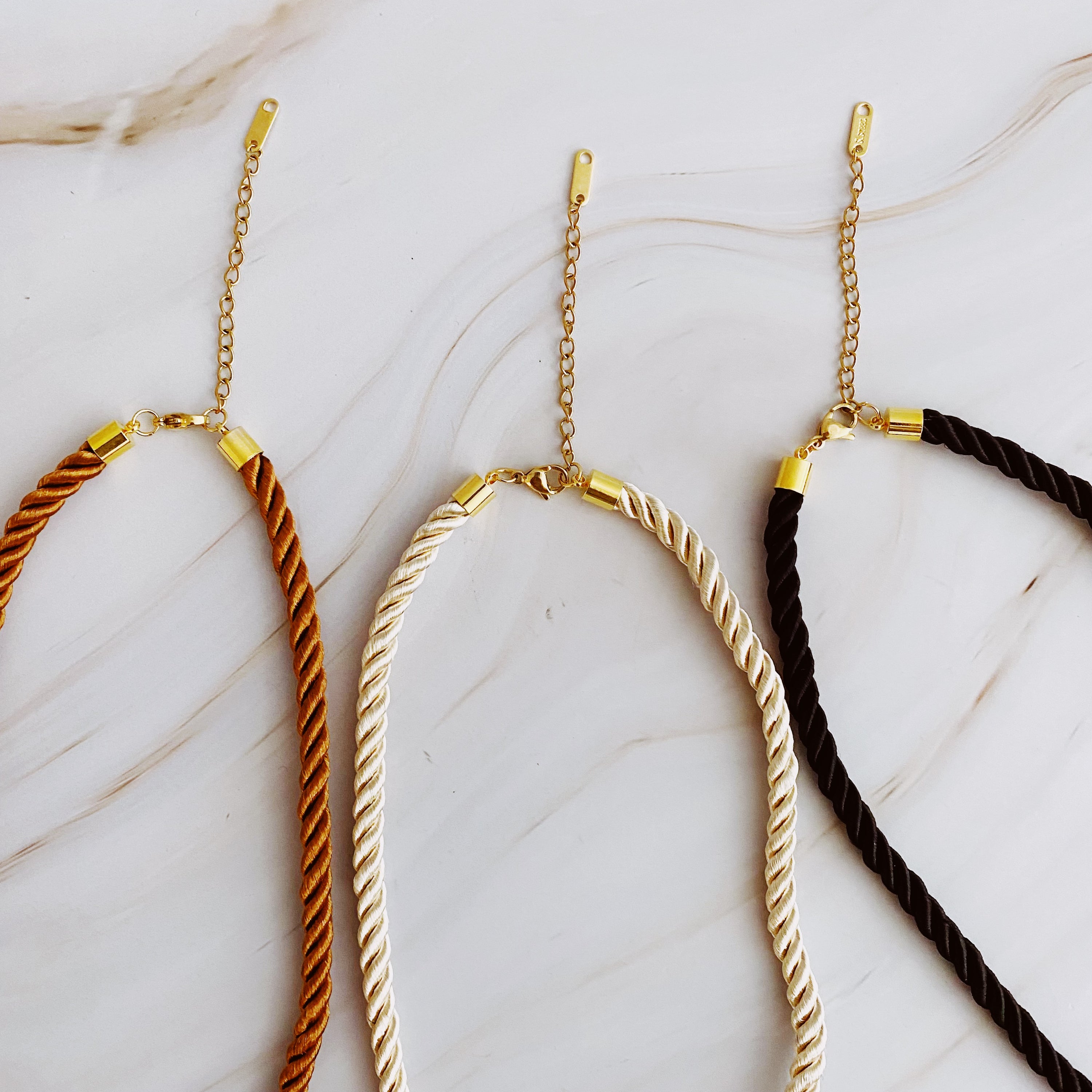 A stylish Satin Rope Baroque Pearl Necklace featuring a unique baroque pearl and elegant satin rope design, perfect for any occasion.