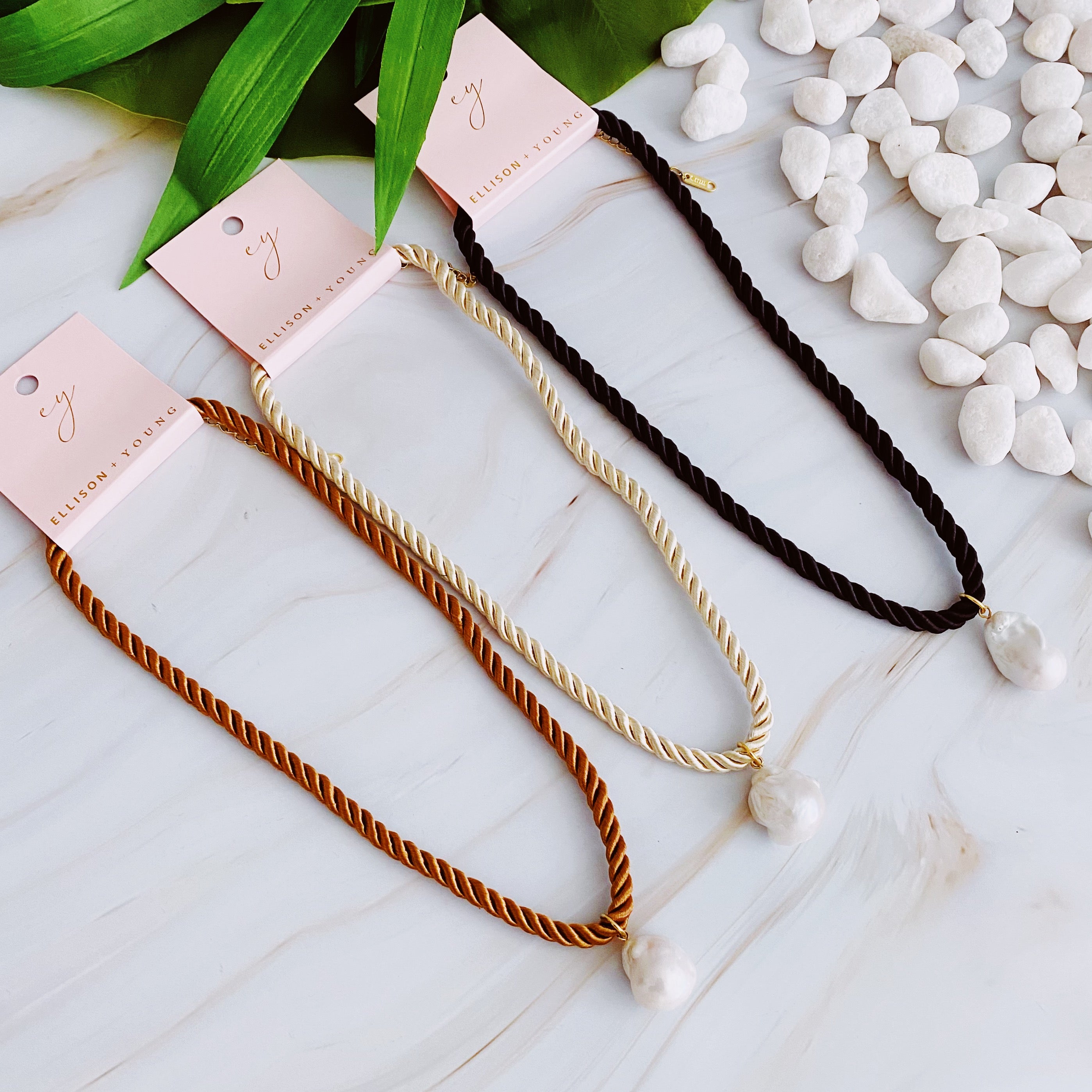 A stylish Satin Rope Baroque Pearl Necklace featuring a unique baroque pearl and elegant satin rope design, perfect for any occasion.