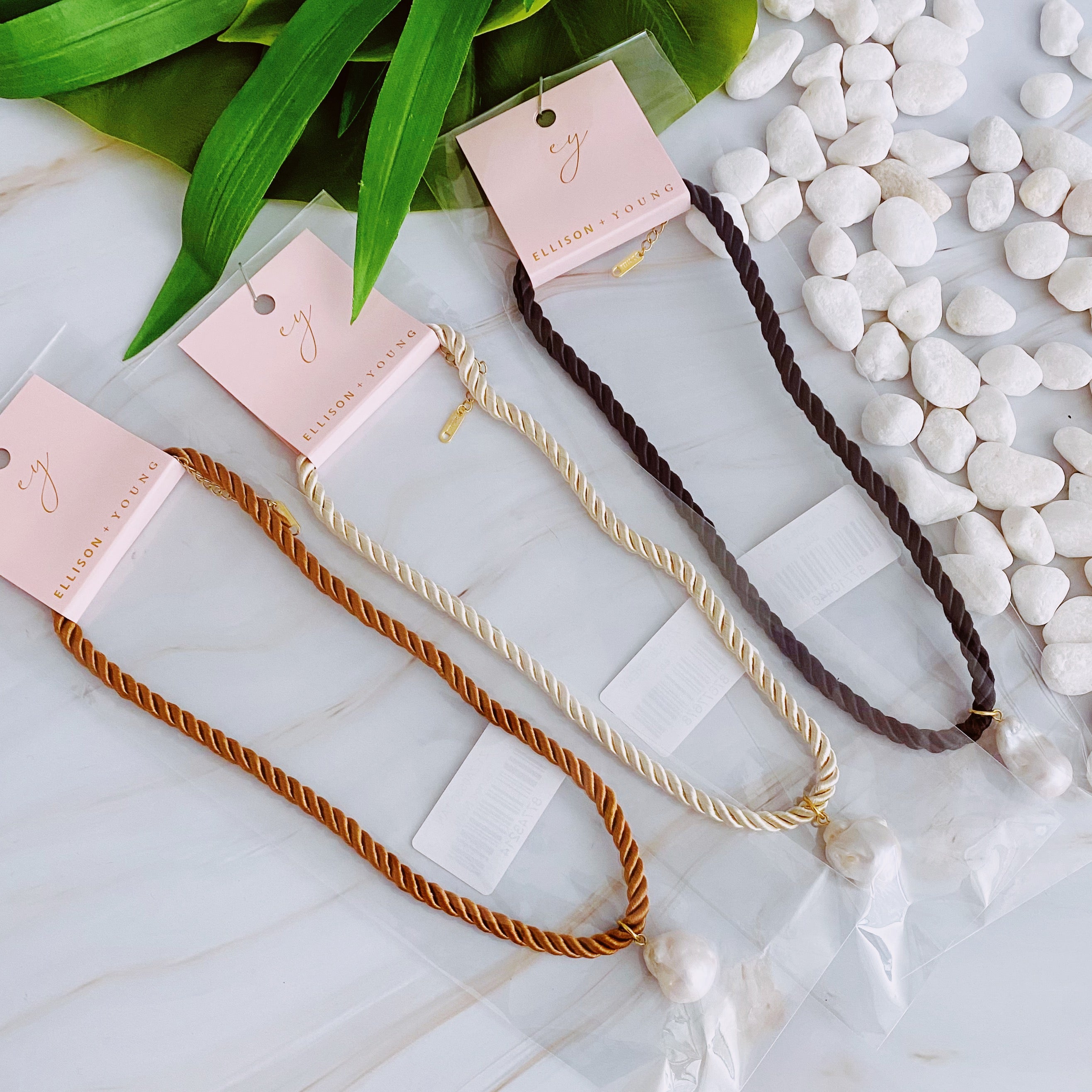 A stylish Satin Rope Baroque Pearl Necklace featuring a unique baroque pearl and elegant satin rope design, perfect for any occasion.