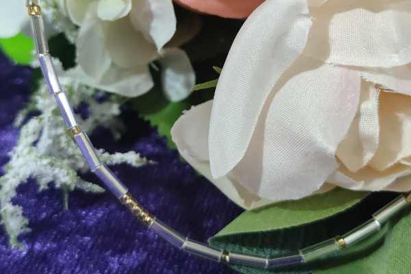 A stylish anklet featuring the word 'Mom' in Morse code, designed for mothers.