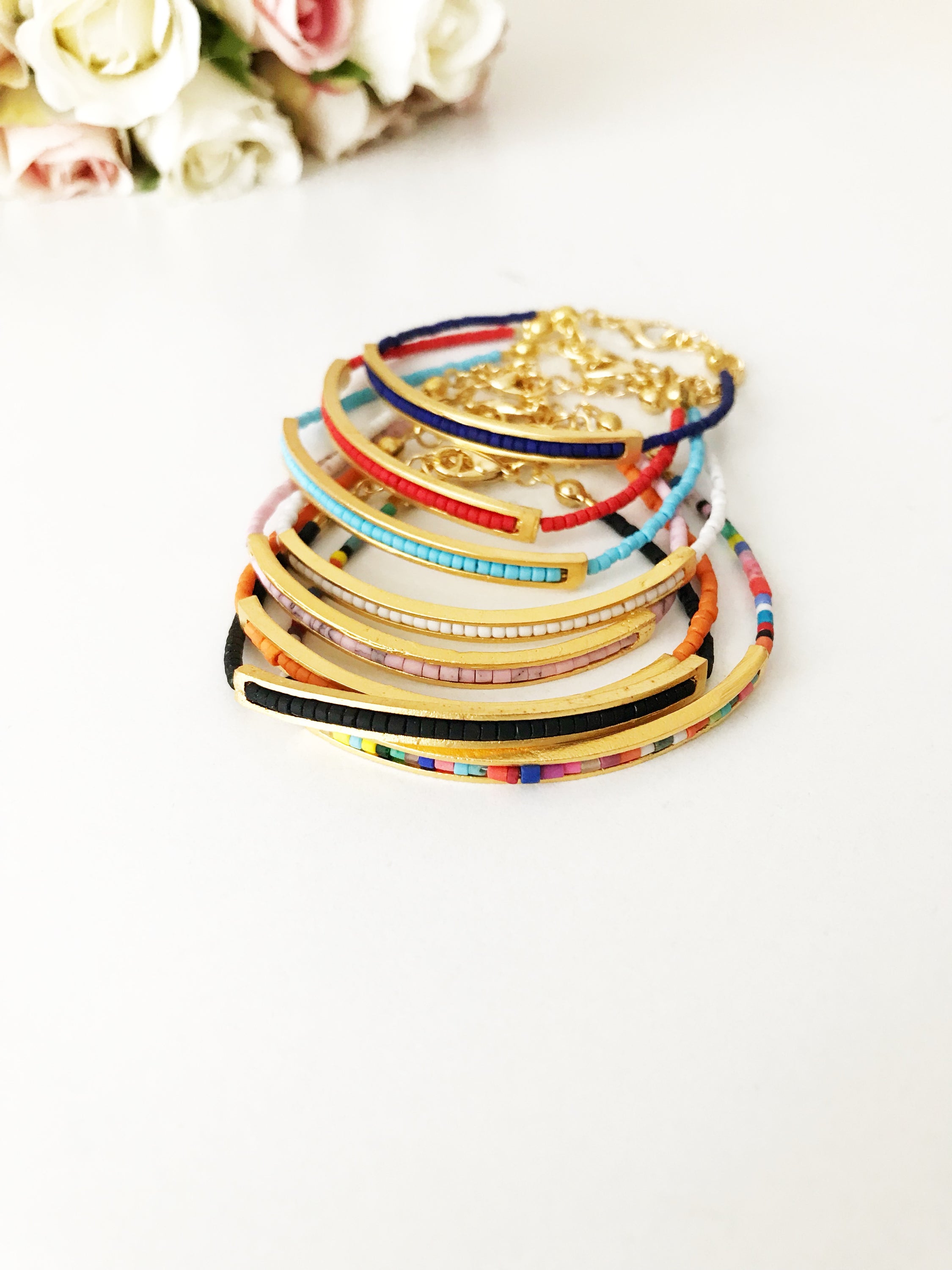 Handmade Seed Beads Bracelet featuring blue Miyuki beads and a delicate gold chain, symbolizing luck and protection.