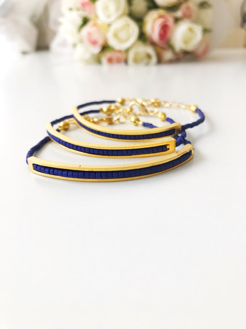 Handmade Seed Beads Bracelet featuring blue Miyuki beads and a delicate gold chain, symbolizing luck and protection.