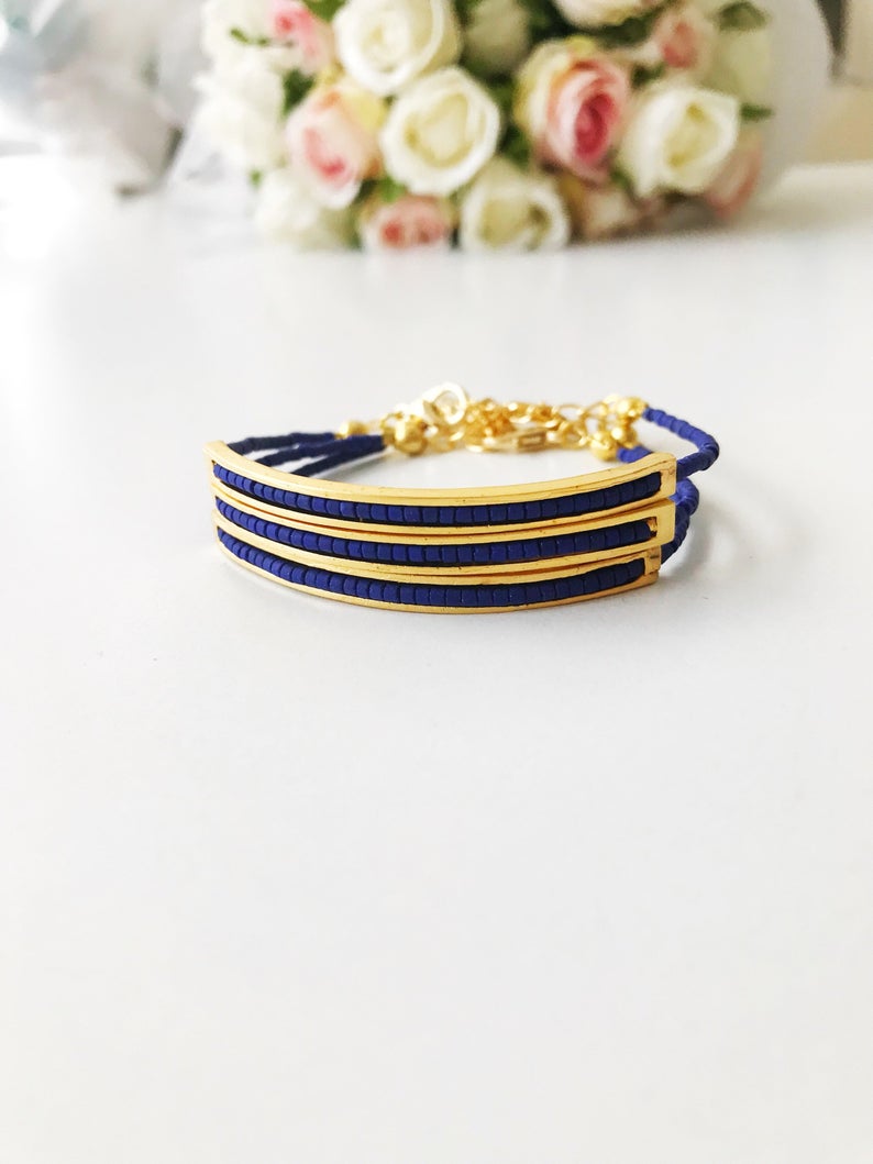Handmade Seed Beads Bracelet featuring blue Miyuki beads and a delicate gold chain, symbolizing luck and protection.