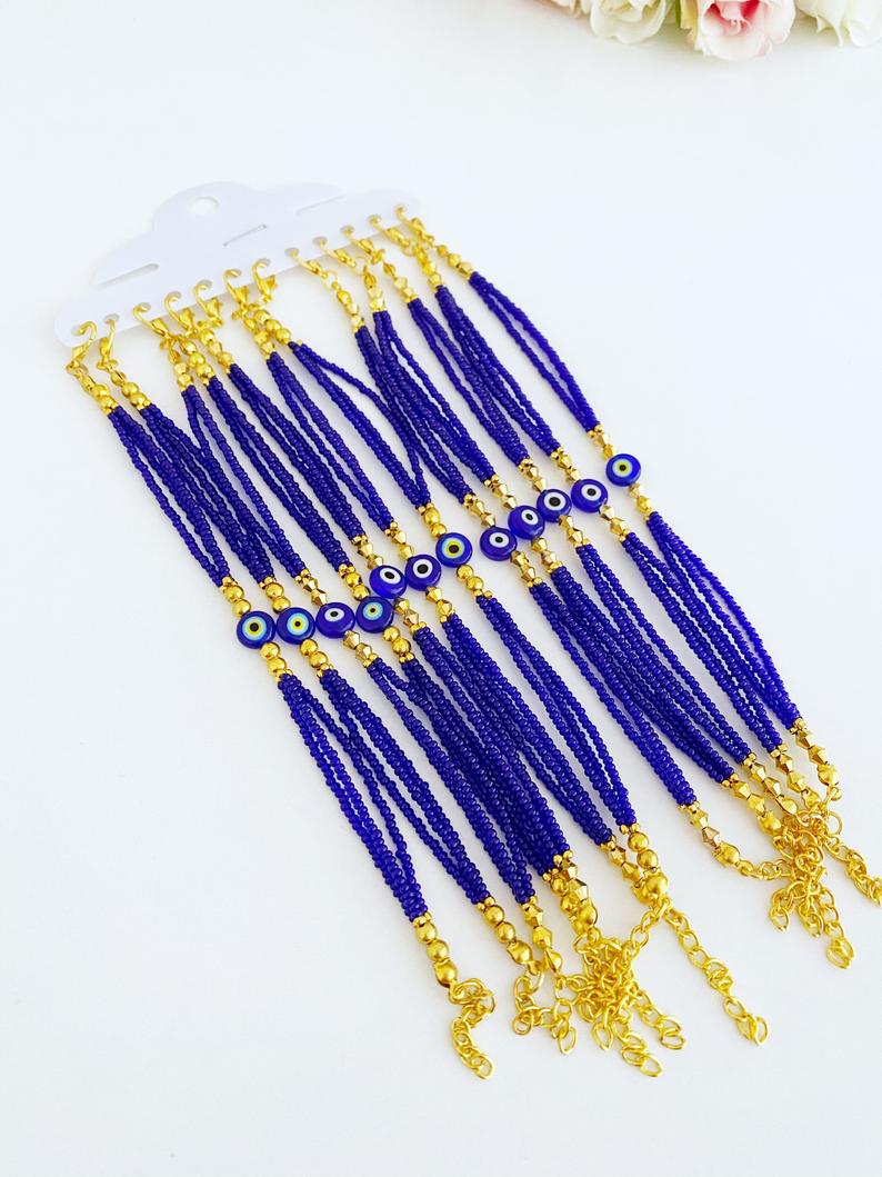 Handmade Seed Beads Evil Eye Bracelet featuring colorful Miyuki beads in blue, red, turquoise, and white.