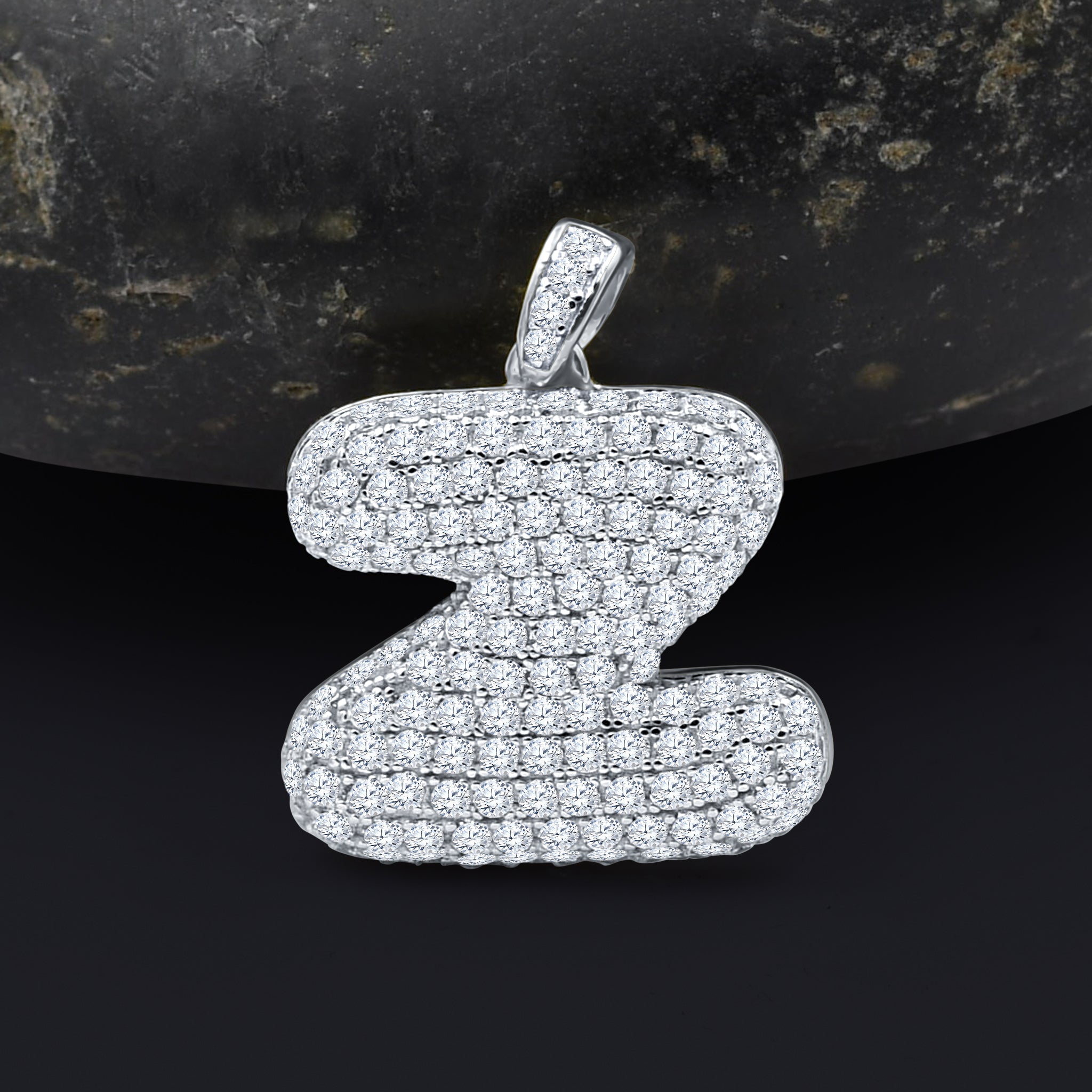 SEIGNEURIAL Initial Pendant featuring a personalized letter adorned with cubic zirconia stones in sterling silver or gold plating.
