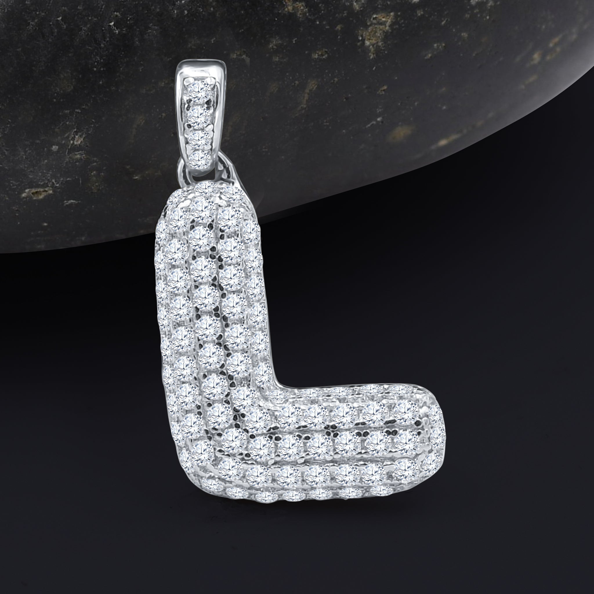 SEIGNEURIAL Initial Pendant featuring a personalized letter adorned with cubic zirconia stones in sterling silver or gold plating.