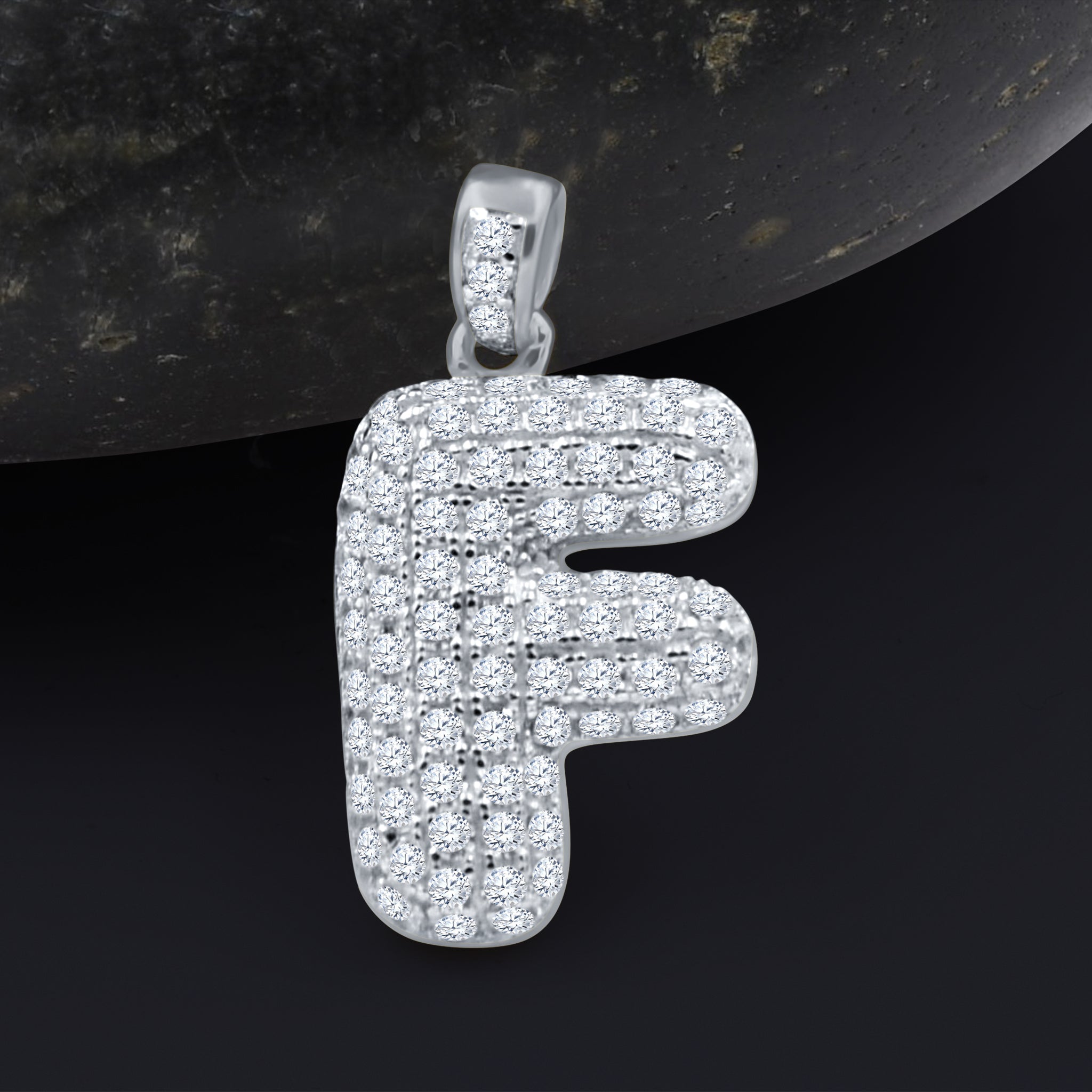 SEIGNEURIAL Initial Pendant featuring a personalized letter adorned with cubic zirconia stones in sterling silver or gold plating.
