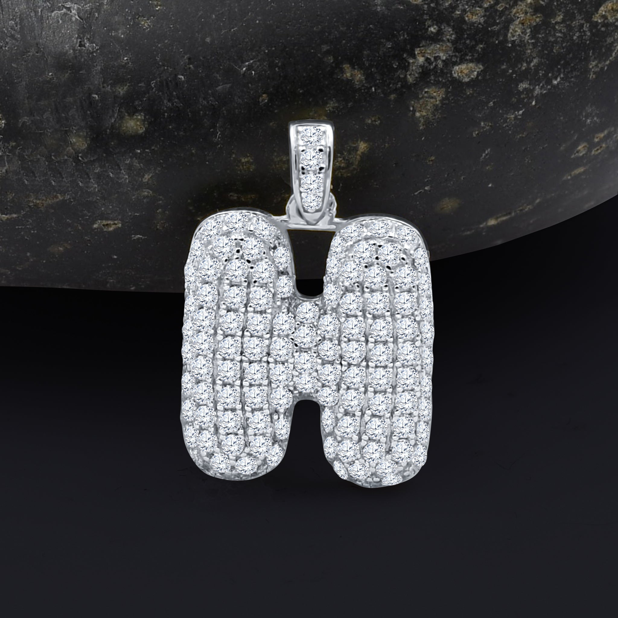 SEIGNEURIAL Initial Pendant featuring a personalized letter adorned with cubic zirconia stones in sterling silver or gold plating.