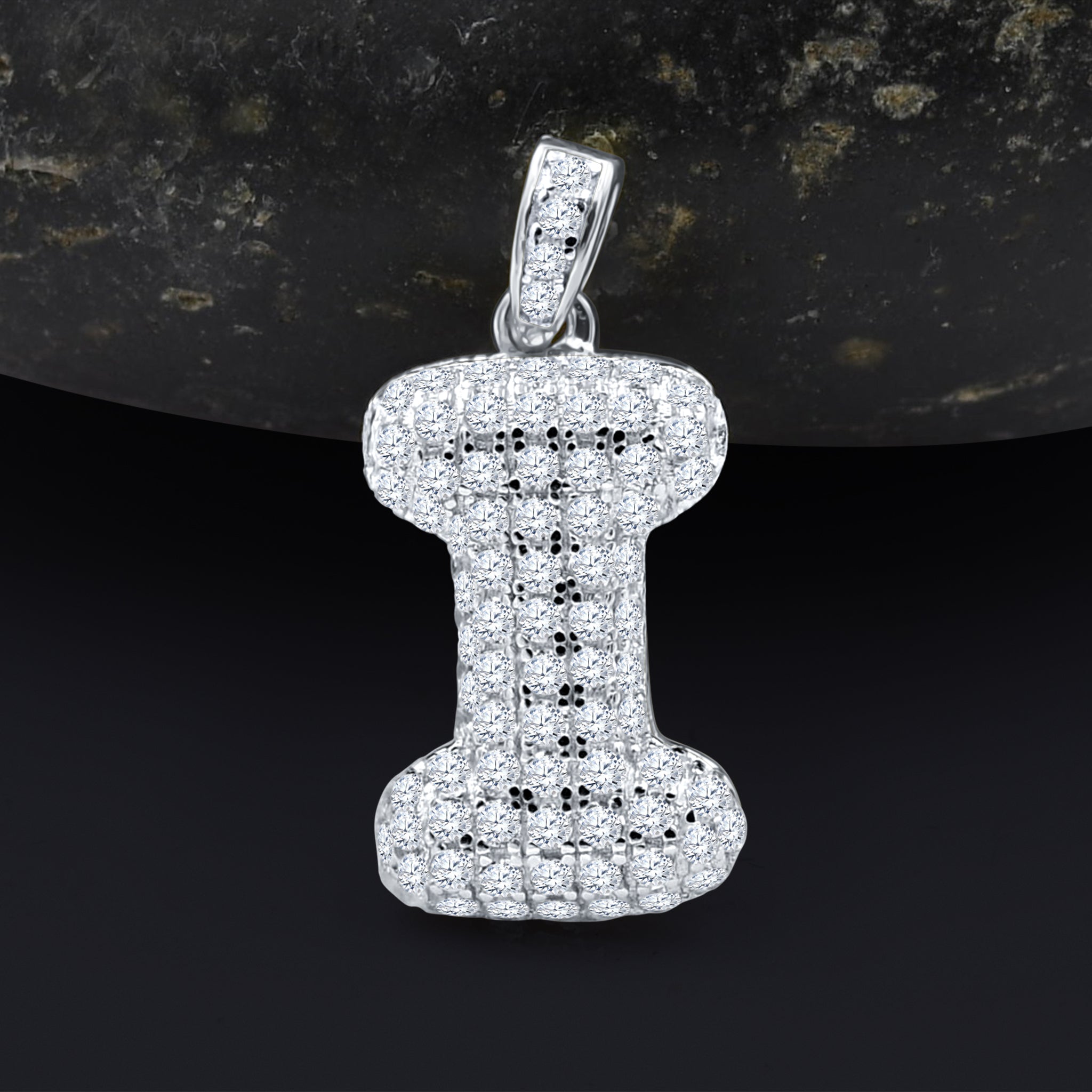 SEIGNEURIAL Initial Pendant featuring a personalized letter adorned with cubic zirconia stones in sterling silver or gold plating.