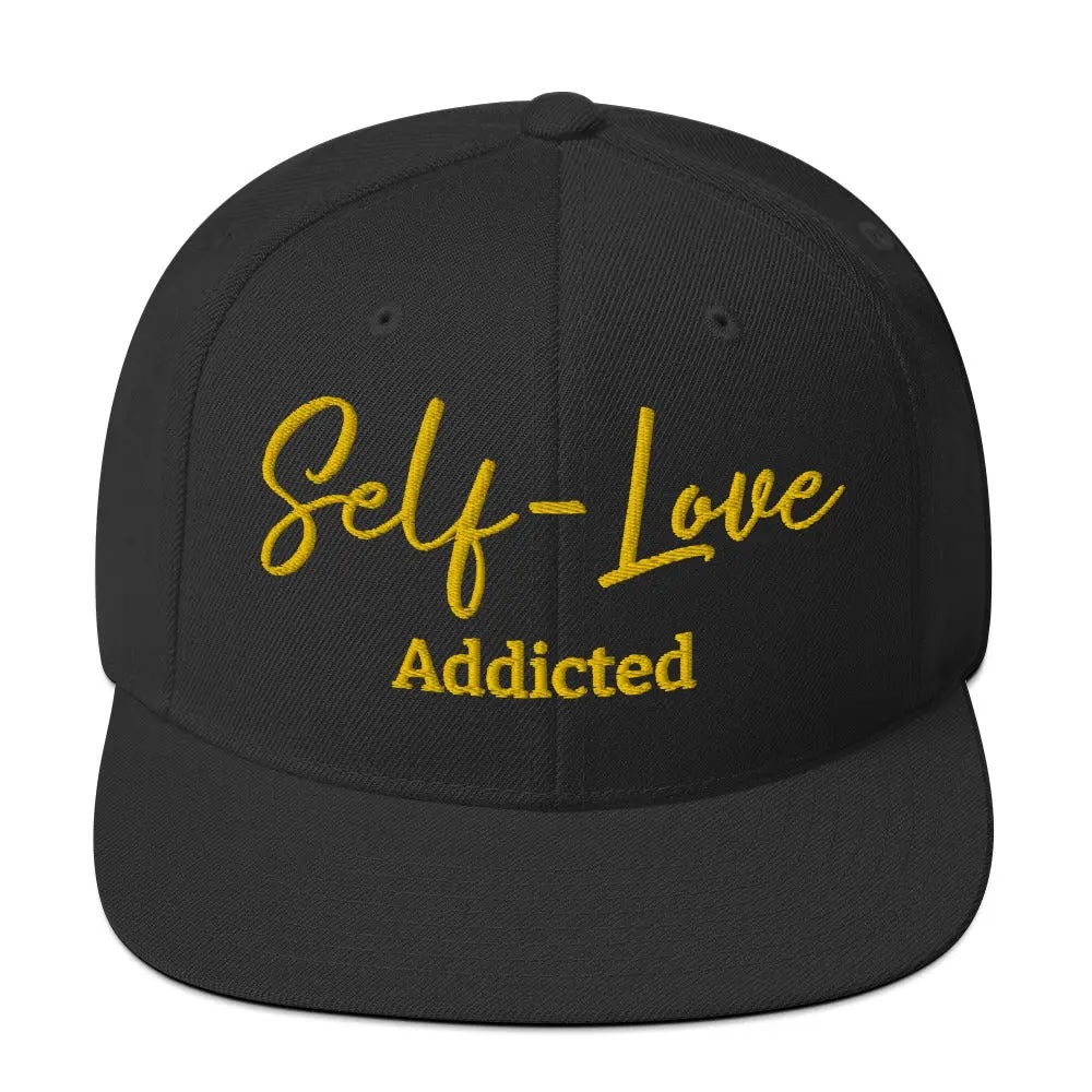 Self Love Addicted Snapback Hat with flat brim and embroidered details, showcasing a stylish and structured design.