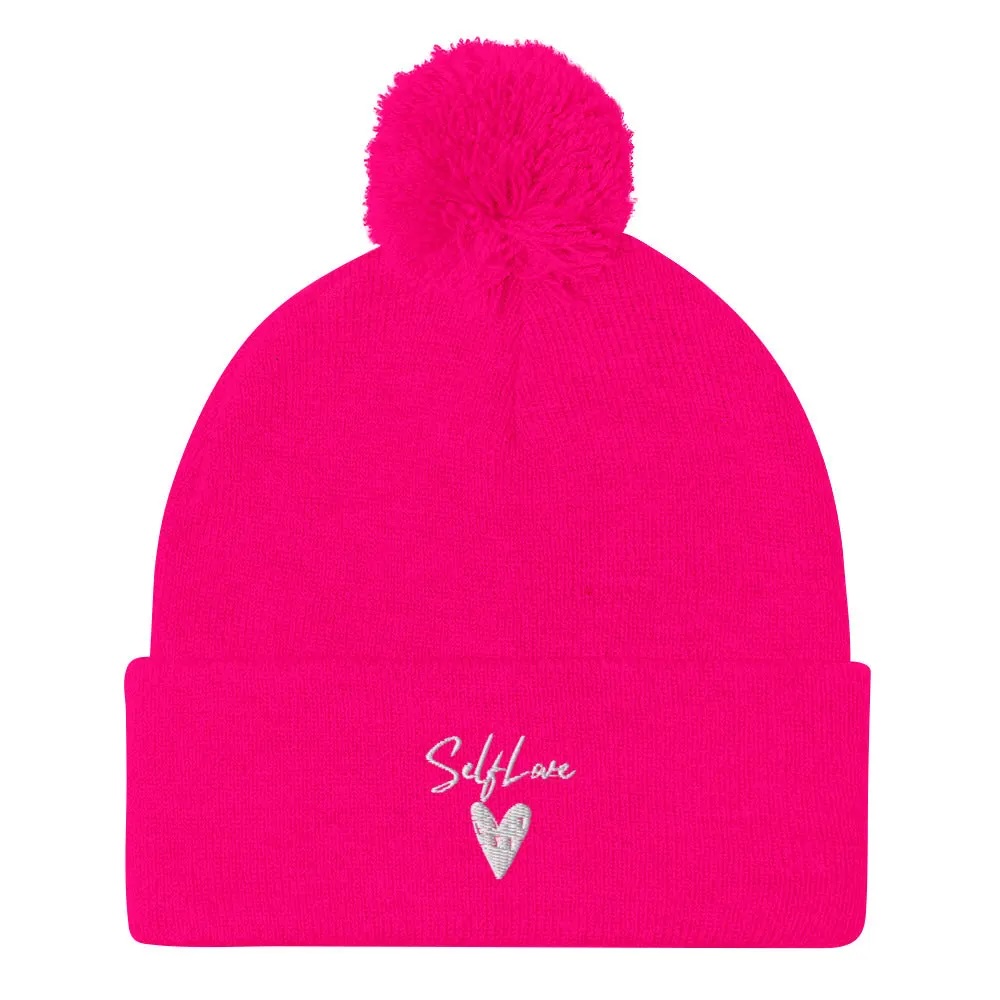 Self Love Pom-Pom Beanie featuring an embroidered design and a fluffy pom-pom on top, perfect for winter wear.