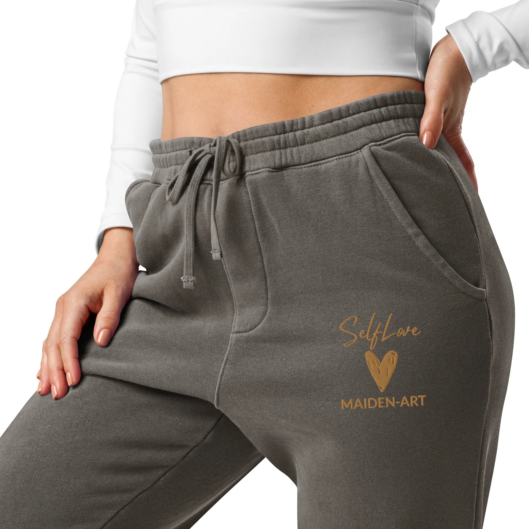 Self Love unisex pigment-dyed sweatpants with Old Gold embroidery, featuring pockets and adjustable drawstrings.