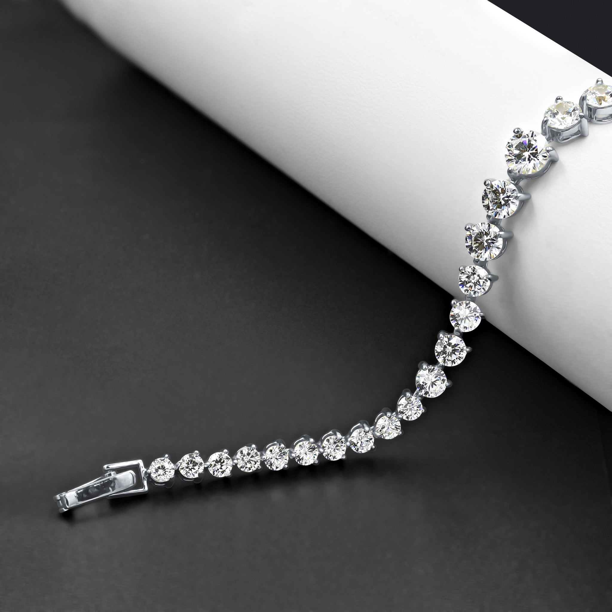 SERAC Brass Iced Out 8" Bracelet featuring sparkling CZ stones set in a prong design, showcasing elegance and style.