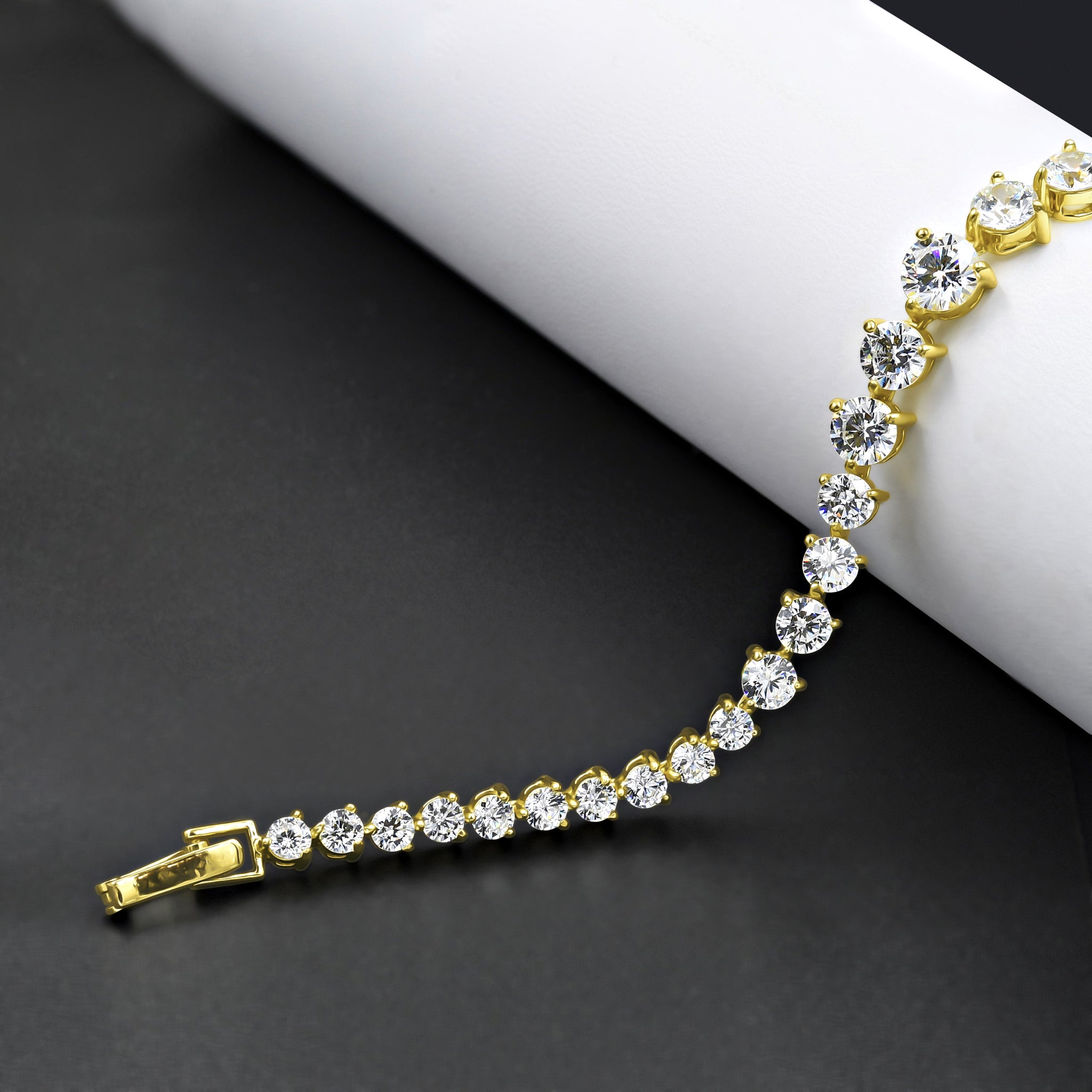 SERAC Brass Iced Out 8" Bracelet featuring sparkling CZ stones set in a prong design, showcasing elegance and style.