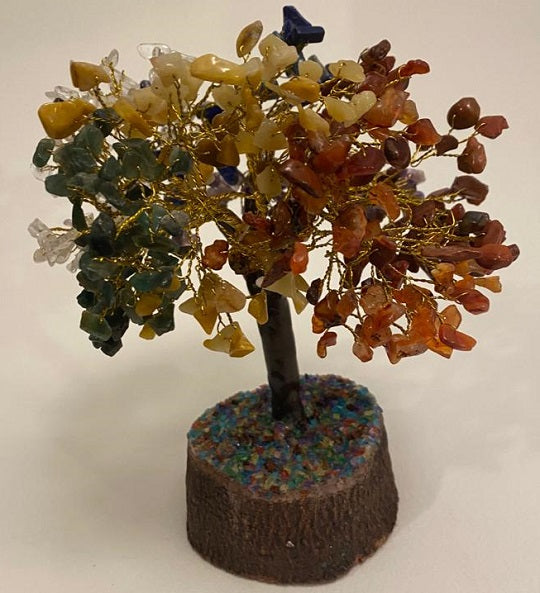 A beautifully crafted Seven Chakra Gemstone Tree featuring 500 chips of various healing crystals, symbolizing good luck and prosperity.