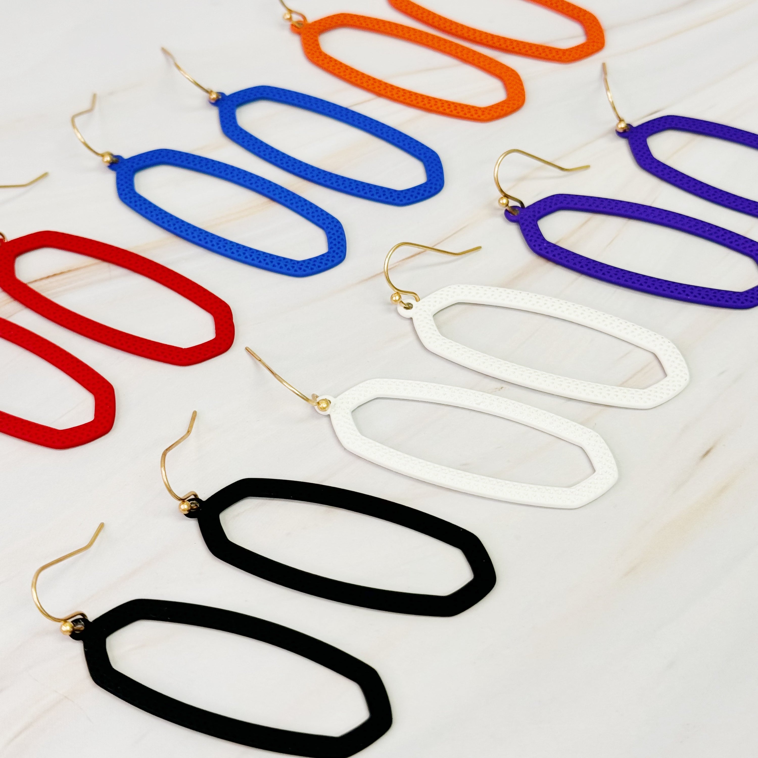 Colorful Shape Of Game Earrings with a minimalist design, perfect for sports fans.