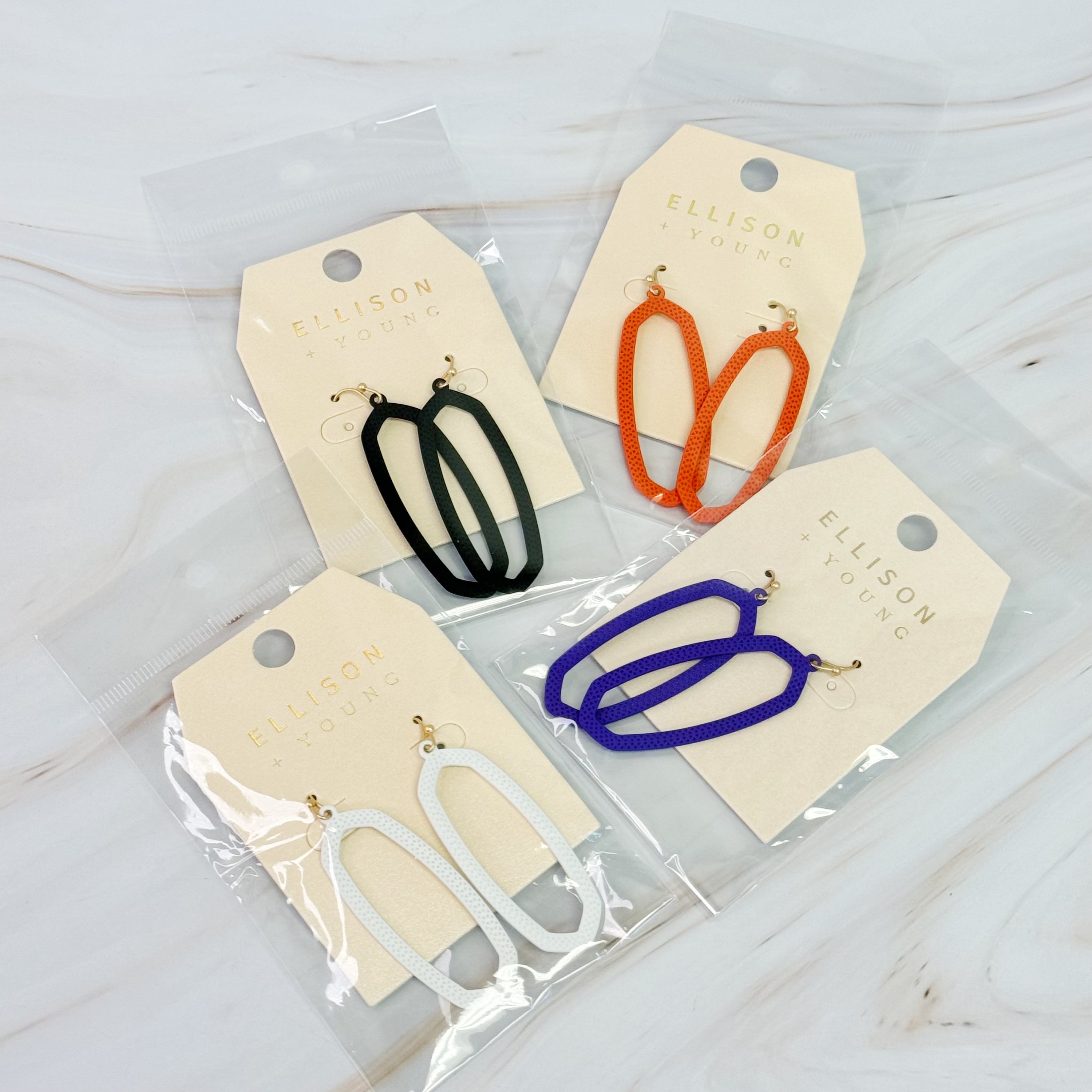 Colorful Shape Of Game Earrings with a minimalist design, perfect for sports fans.