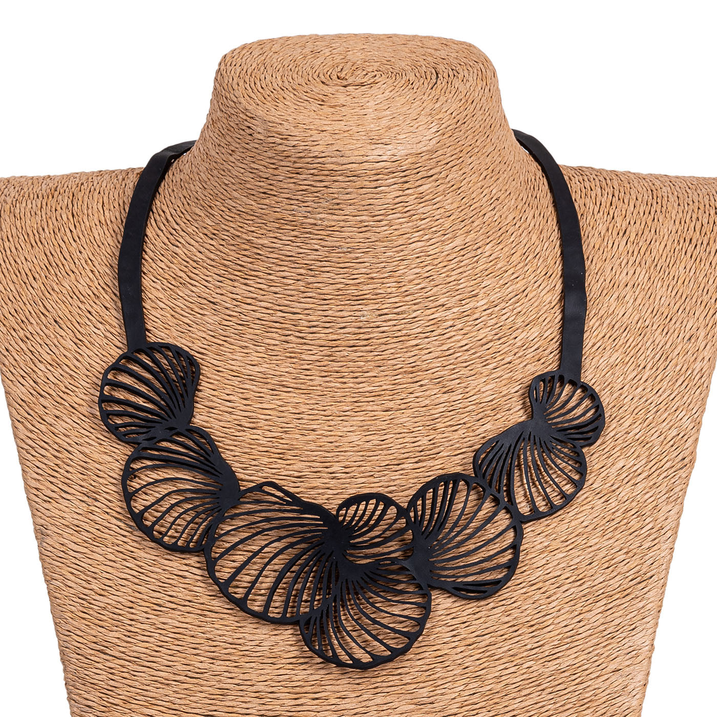 Handcrafted Shell Inner Tube Necklace made from recycled rubber, featuring unique patterns and a comfortable design, presented in a luxury gift box.