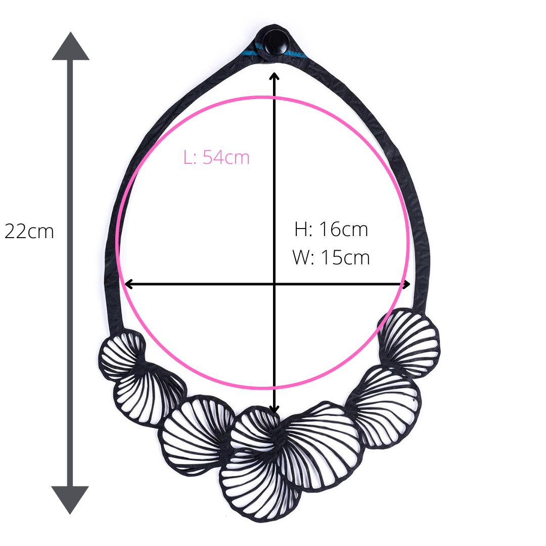 Handcrafted Shell Inner Tube Necklace made from recycled rubber, featuring unique patterns and a comfortable design, presented in a luxury gift box.