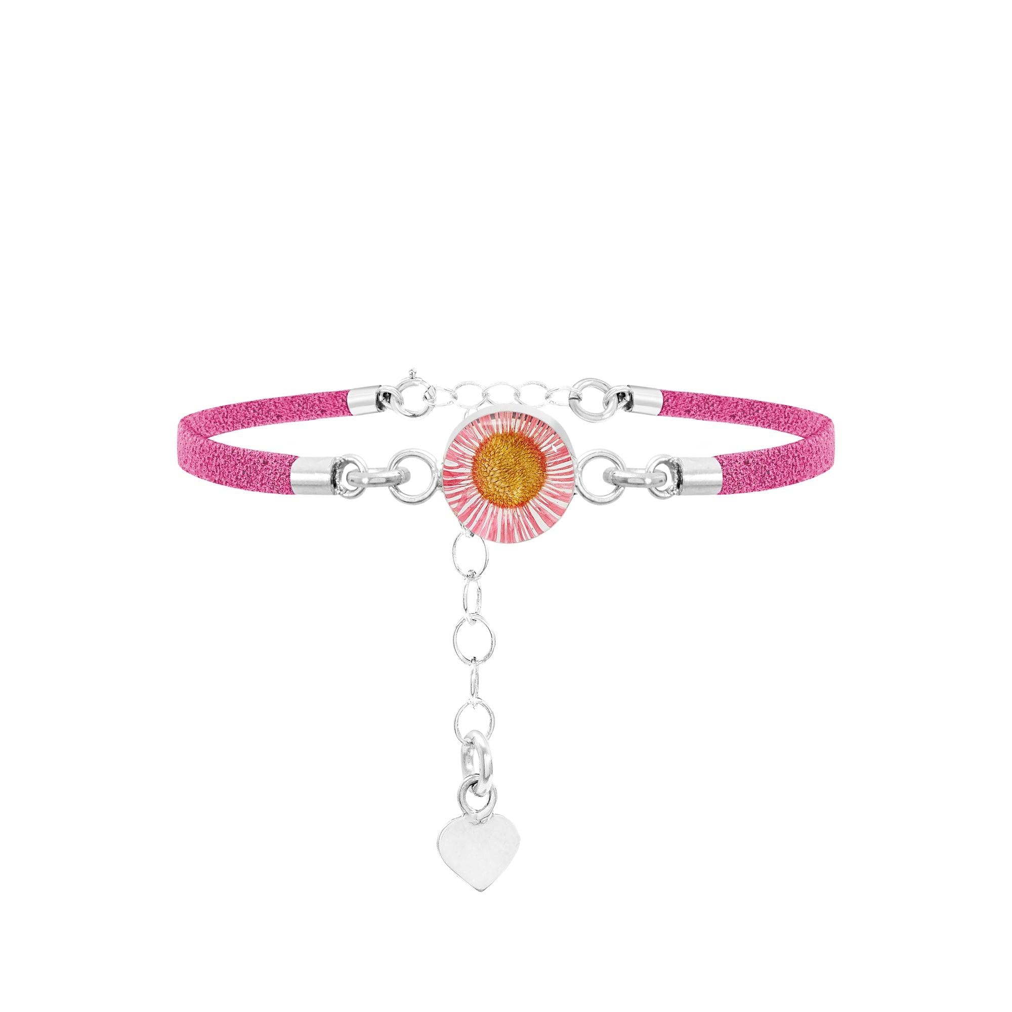 Shrieking Violet Funky Bracelet featuring a pink vegan suede strap and a round charm with a preserved Pink Daisy flower.