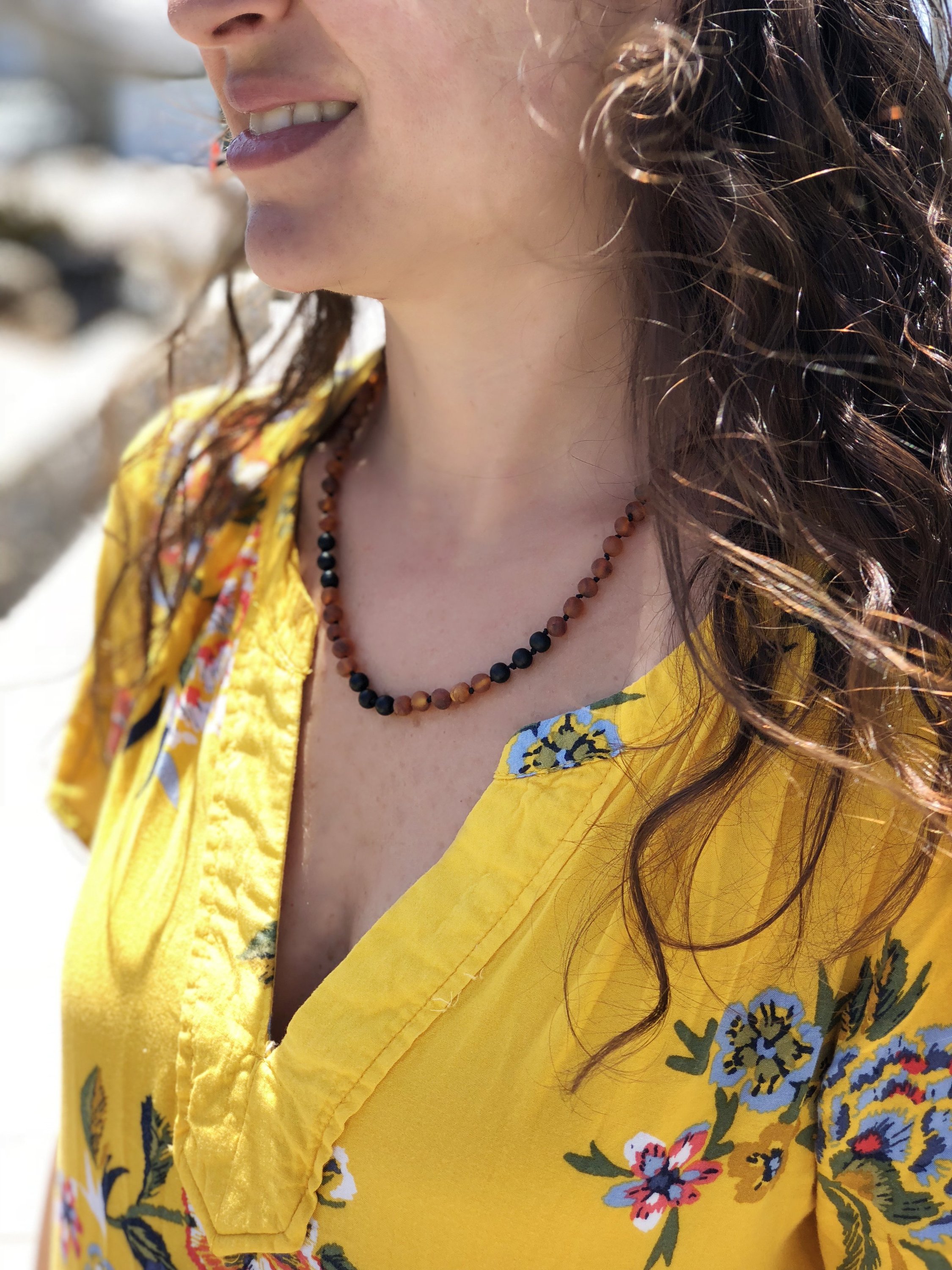 Shungite and Amber necklace designed for adults, featuring raw cognac amber beads and shungite, promoting natural healing and radiation blocking.