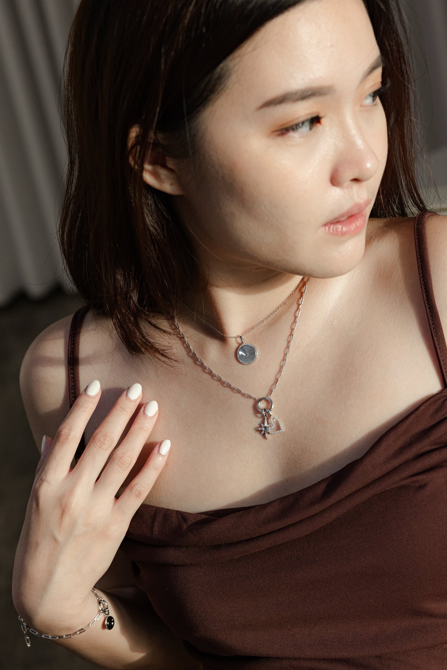 Silver Charm Carrier Necklace Chain with adjustable length and charm holder, elegantly designed for personalization.