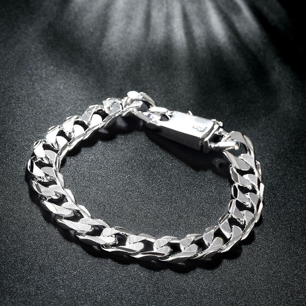 Silver plated unisex curb chain bracelet with toggle clasp, showcasing Italian design and elegant finish.