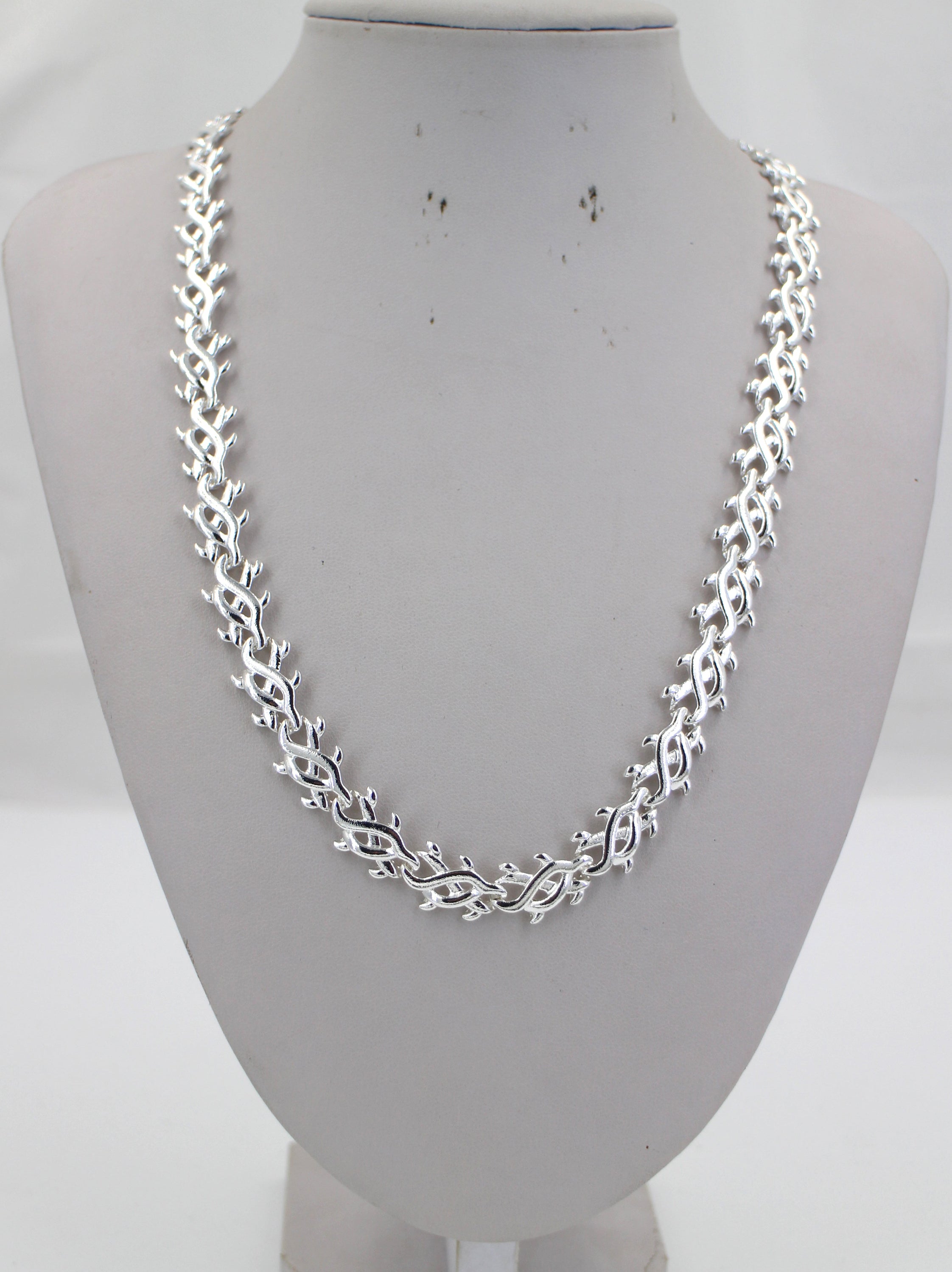 Silver Plating Ayotakashi Olive Branch Statement Necklace featuring an elegant olive branch design, crafted from brass with silver plating.