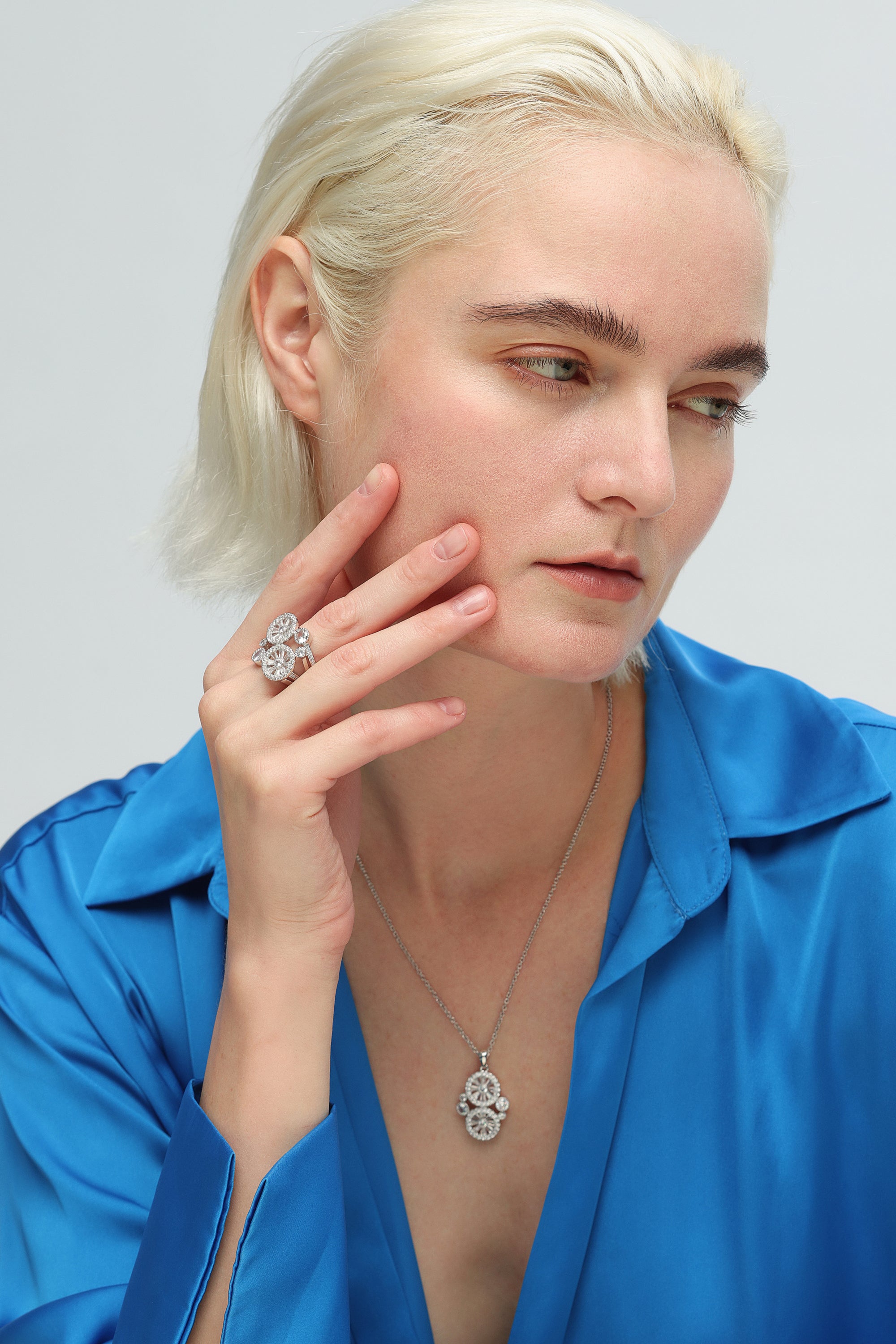 A stunning Silver Wheel of Fortune Signet Ring featuring a unique wheel design and sparkling cubic zirconia.