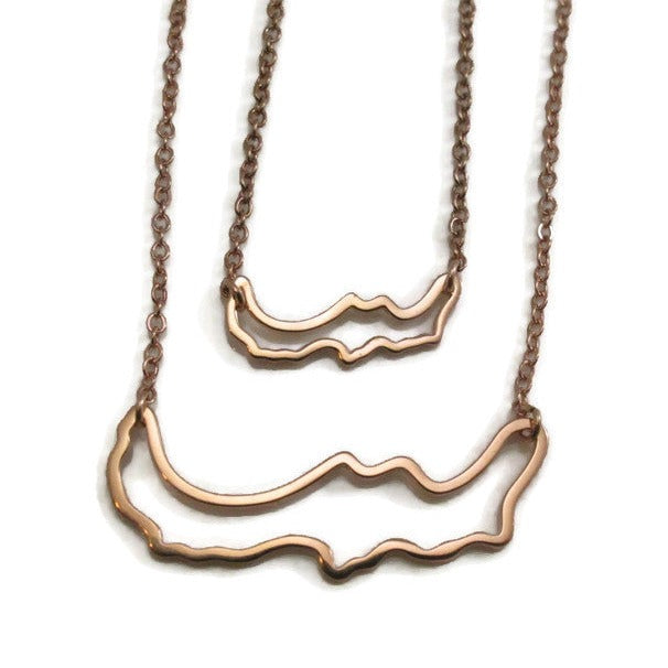 Simply Savary Necklace (Larger) featuring a 45 mm wire frame in sterling silver with optional 18k gold plating, displayed on a chain.