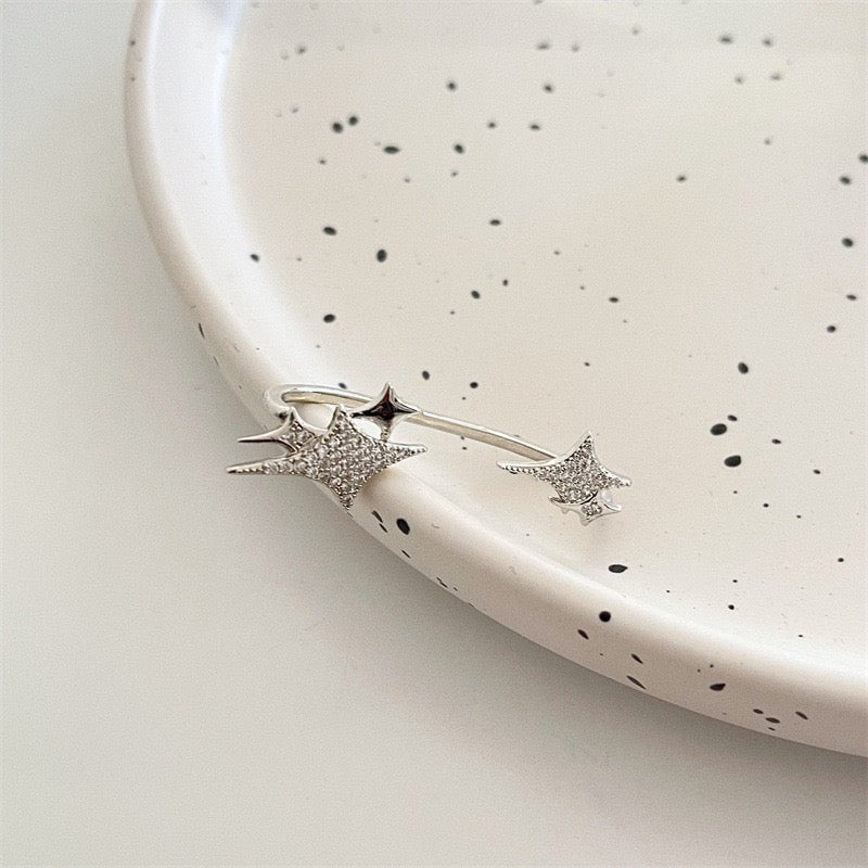 Single Four-Pointed Stars Ear Clip featuring alloy material and rhinestones, showcasing a stylish and elegant design.