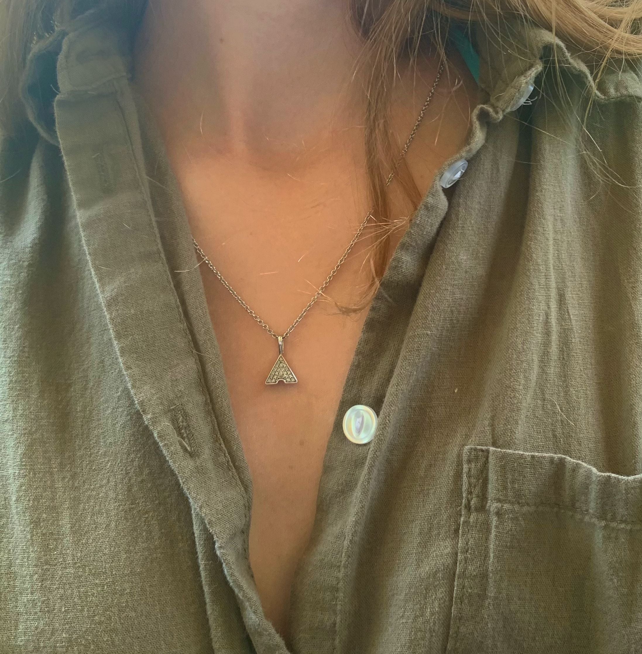 Skyscraper Triangle Diamond Pendant in Sterling Silver featuring natural diamonds and an 18-inch cable chain.