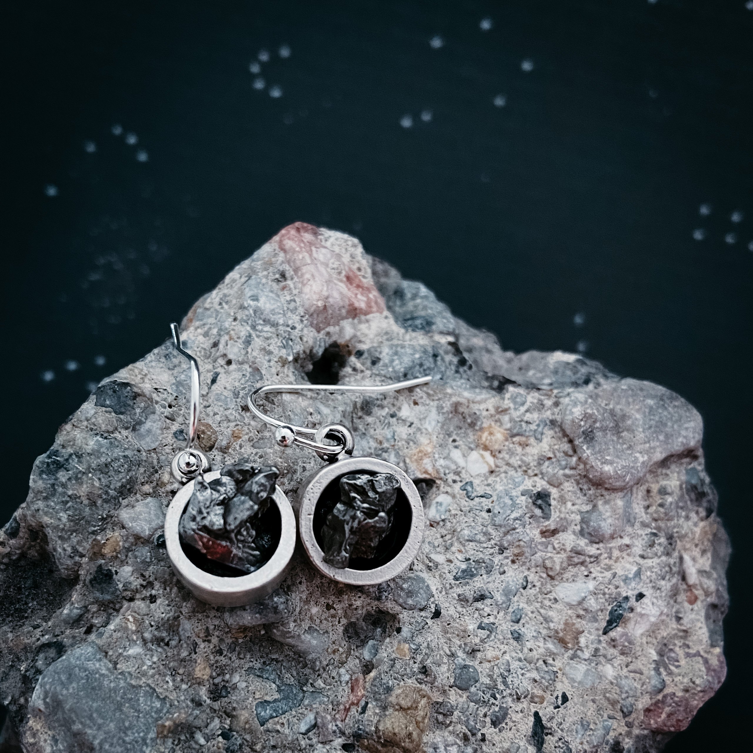 Small Round Raw Meteorite Dangle or Stud Earrings set in thick silver bezel, showcasing unique cosmic stones.