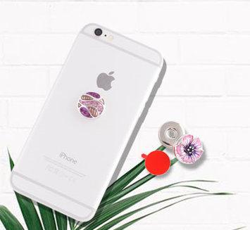 Colorful Snap Jewelry featuring interchangeable snaps and strong adhesive stickers for customization on various surfaces.