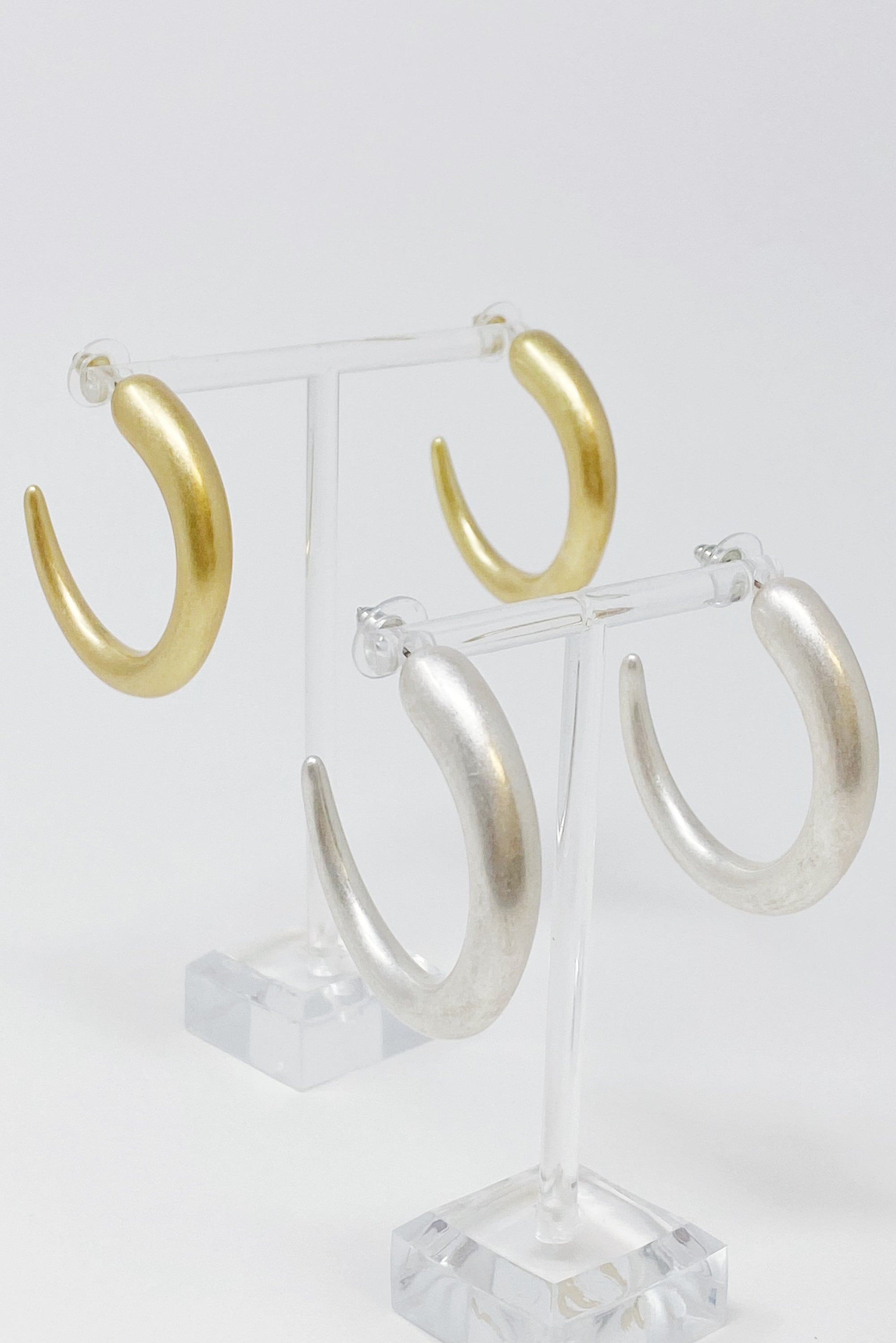 So Smooth Daily Hoop Earrings in gold and silver finish, lightweight and stylish, perfect for everyday wear.