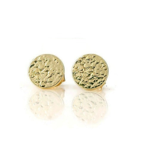A pair of small textured circle stud earrings made of 925 sterling silver, showcasing their sparkling design and available finishes.