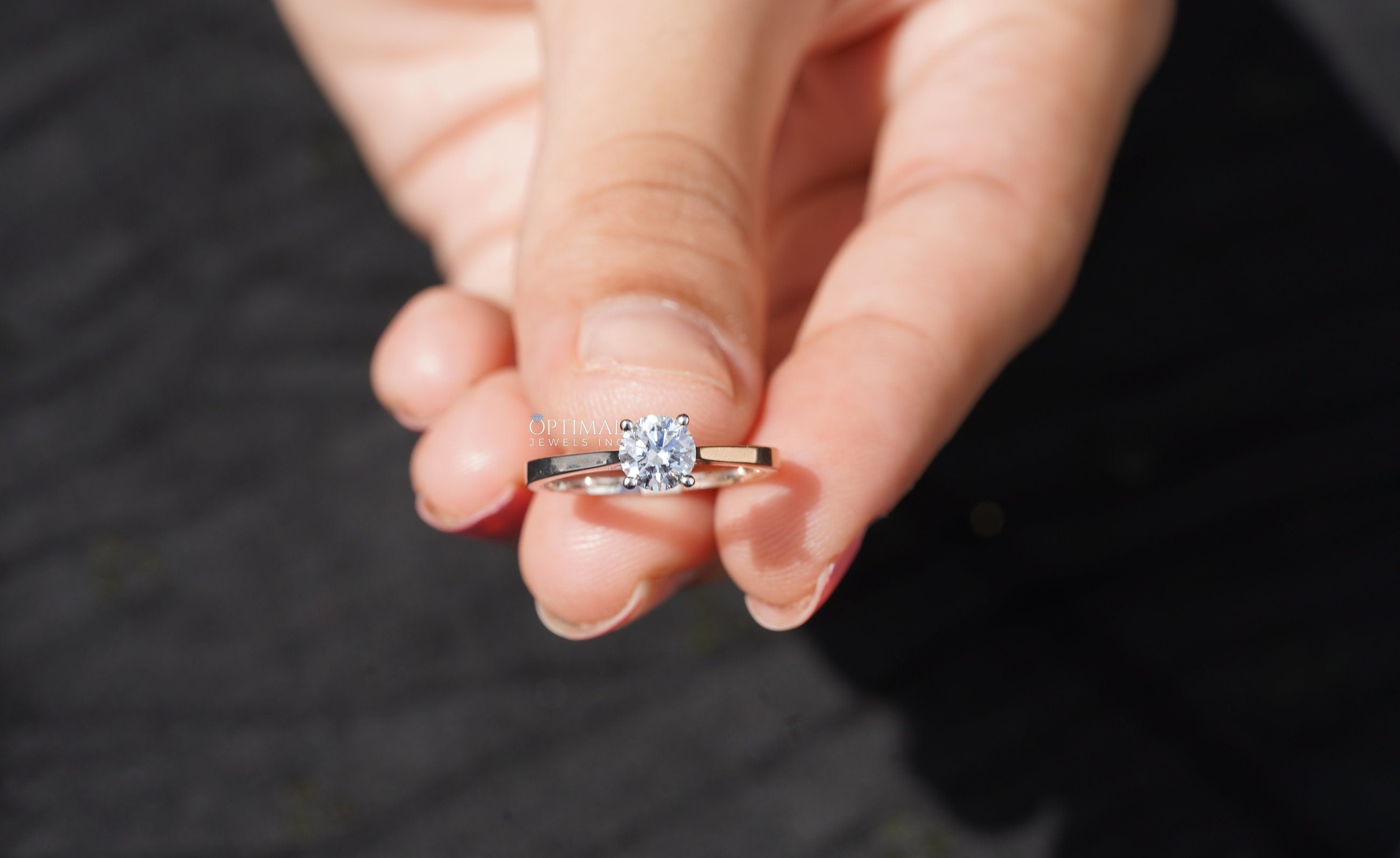 Elegant 0.72 Ctw round cut lab grown diamond solitaire ring in two-tone gold setting, showcasing its brilliance and craftsmanship.