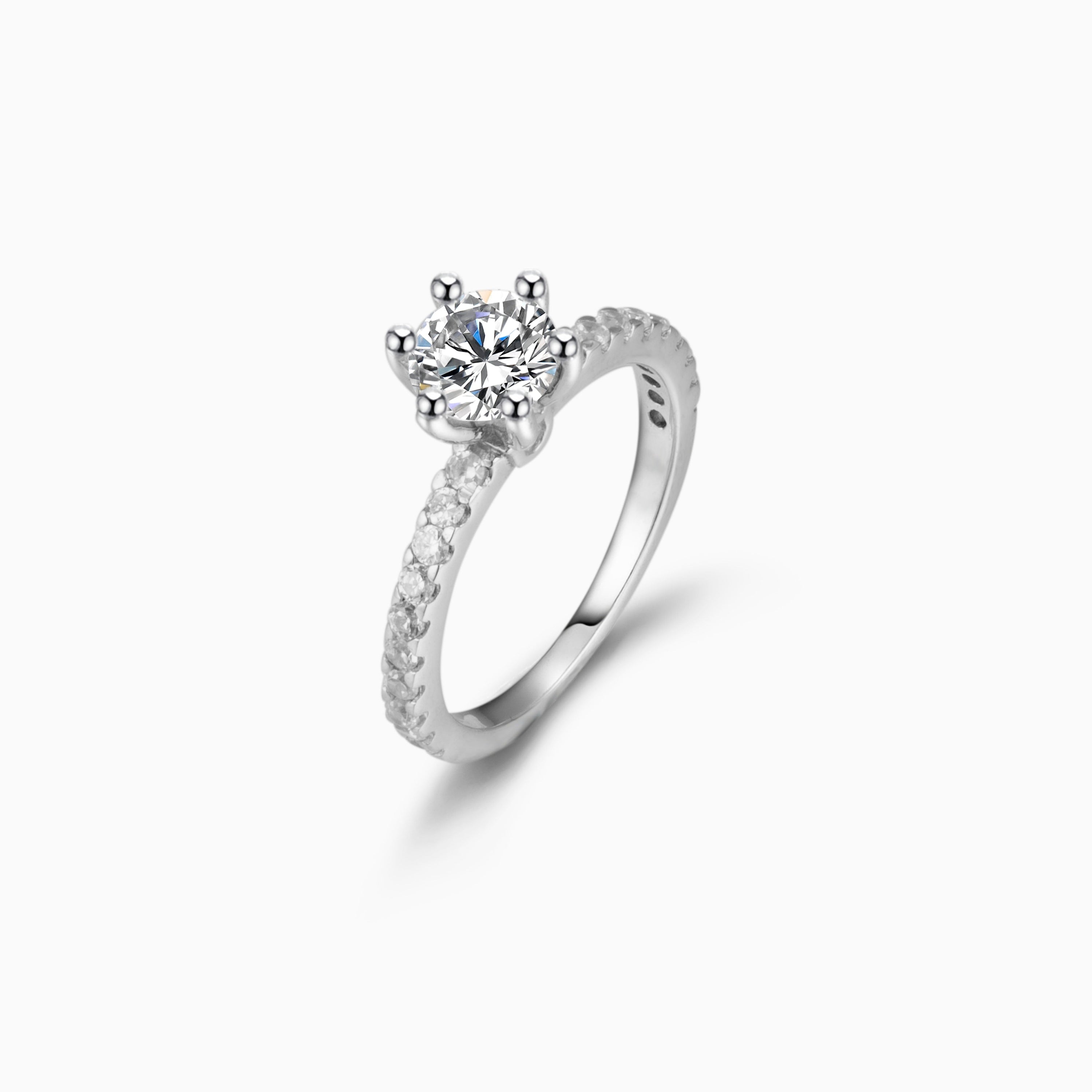 Elegant solitaire white sapphire engagement wedding ring in 925 sterling silver, showcasing a brilliant white sapphire centerpiece.