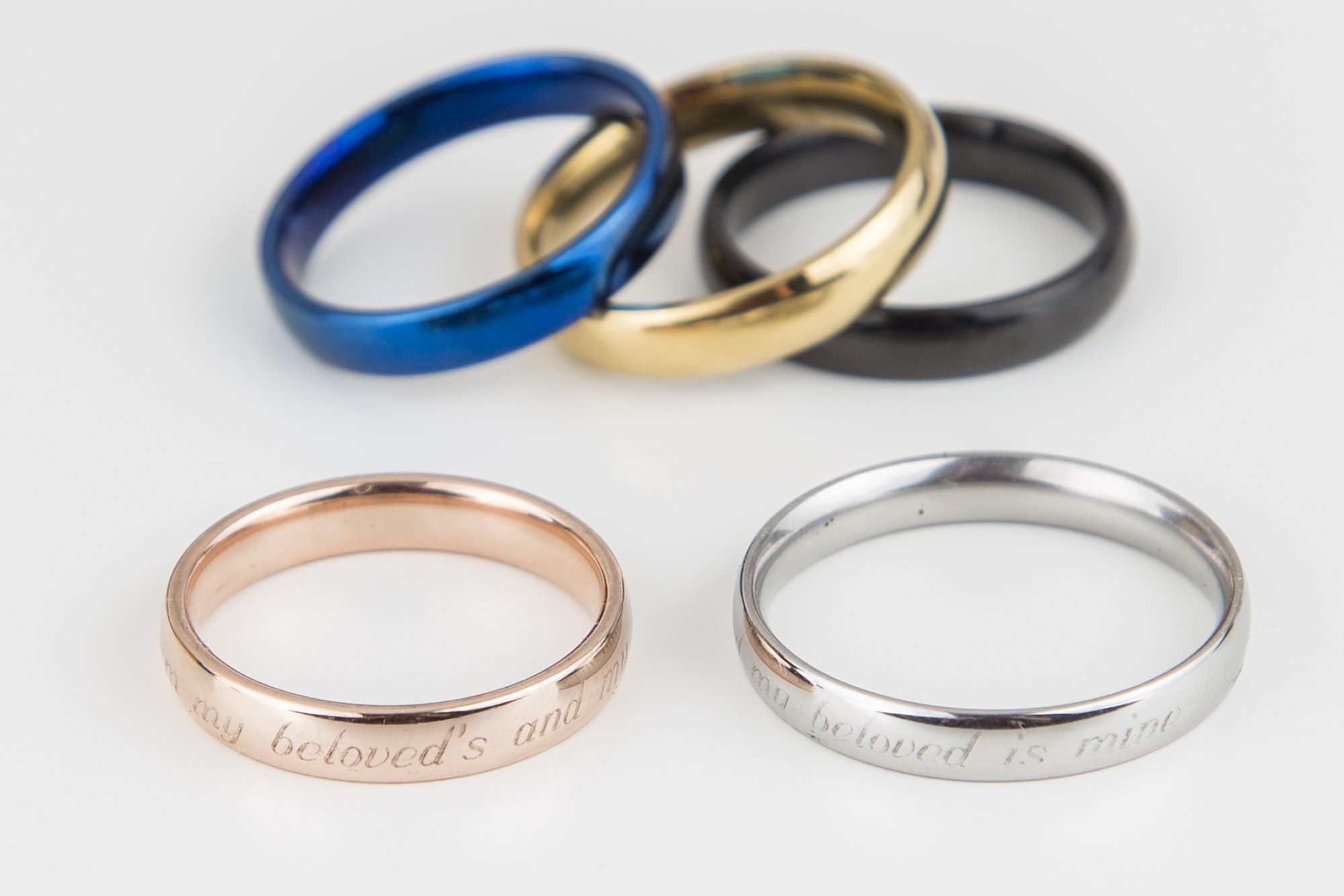 Song 6:3 Wedding Ring featuring the inscription 'I am my beloved's and my beloved is mine' in a shiny gold finish.
