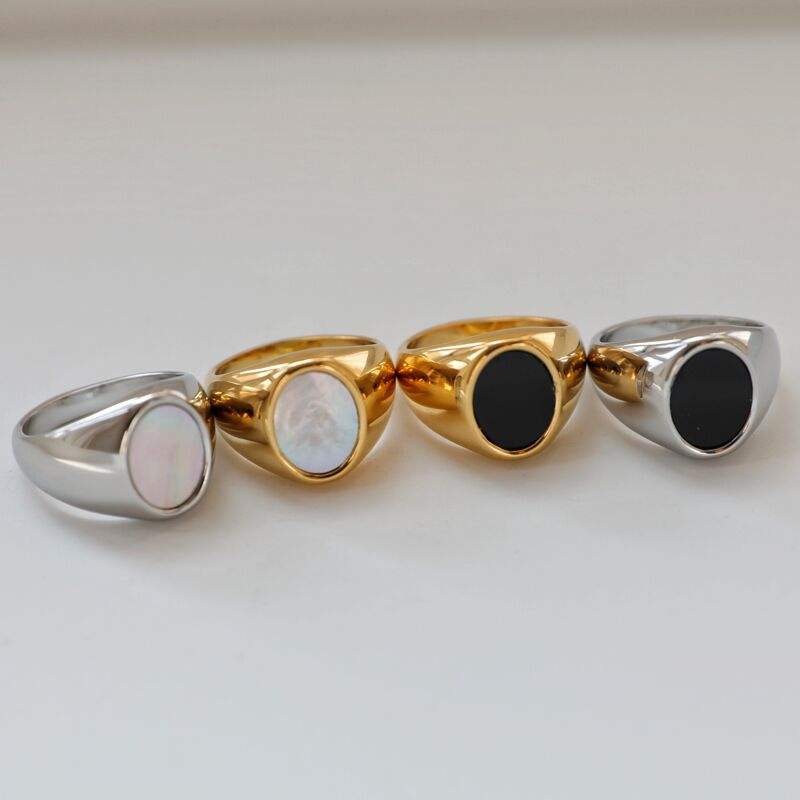 Sophie Signet Enamel Ring featuring a minimalist geometric design in 18k gold plated stainless steel with a black enamel stone.