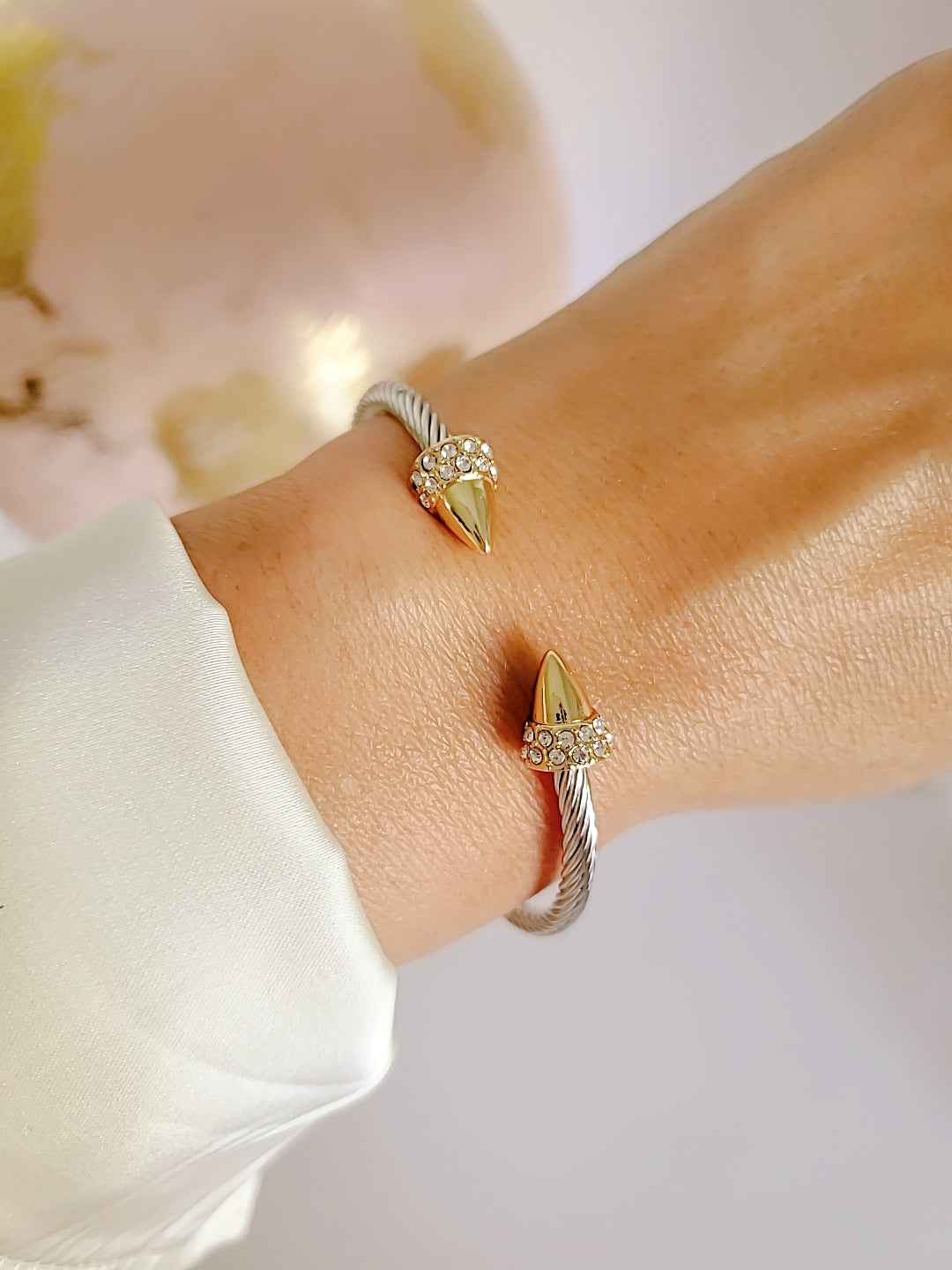 Elegant Spear Bangle Bracelet in 18K gold filled with simulated diamonds, showcasing a unique spear design.