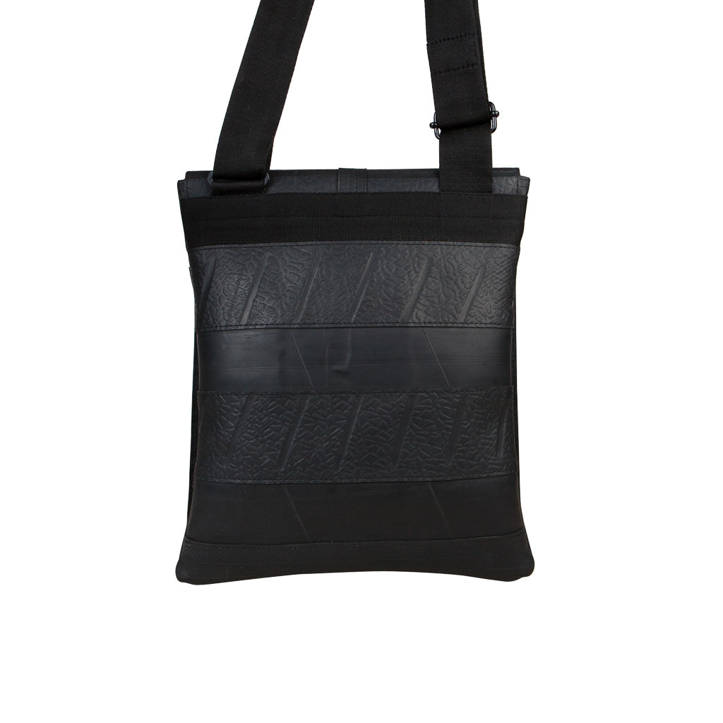 Spencer Recycled Rubber Vegan Crossbody Bag showcasing unique patterns and textures from reclaimed inner tubes, available in three sizes.