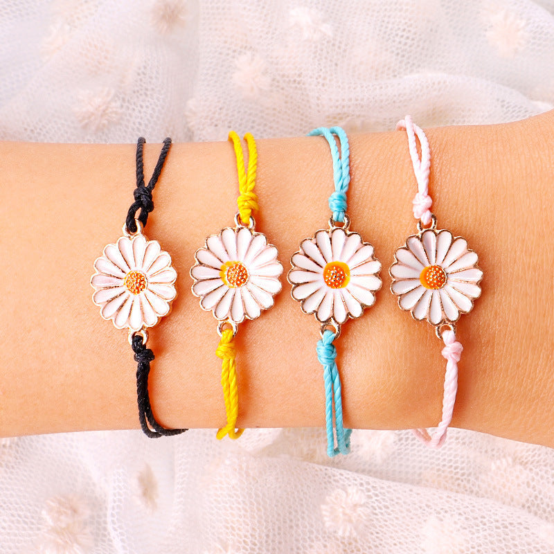 A vibrant Spring Time Multi-Daisies Floral Bracelet featuring colorful daisies on a stretchable brass chain, perfect for all wrist sizes.